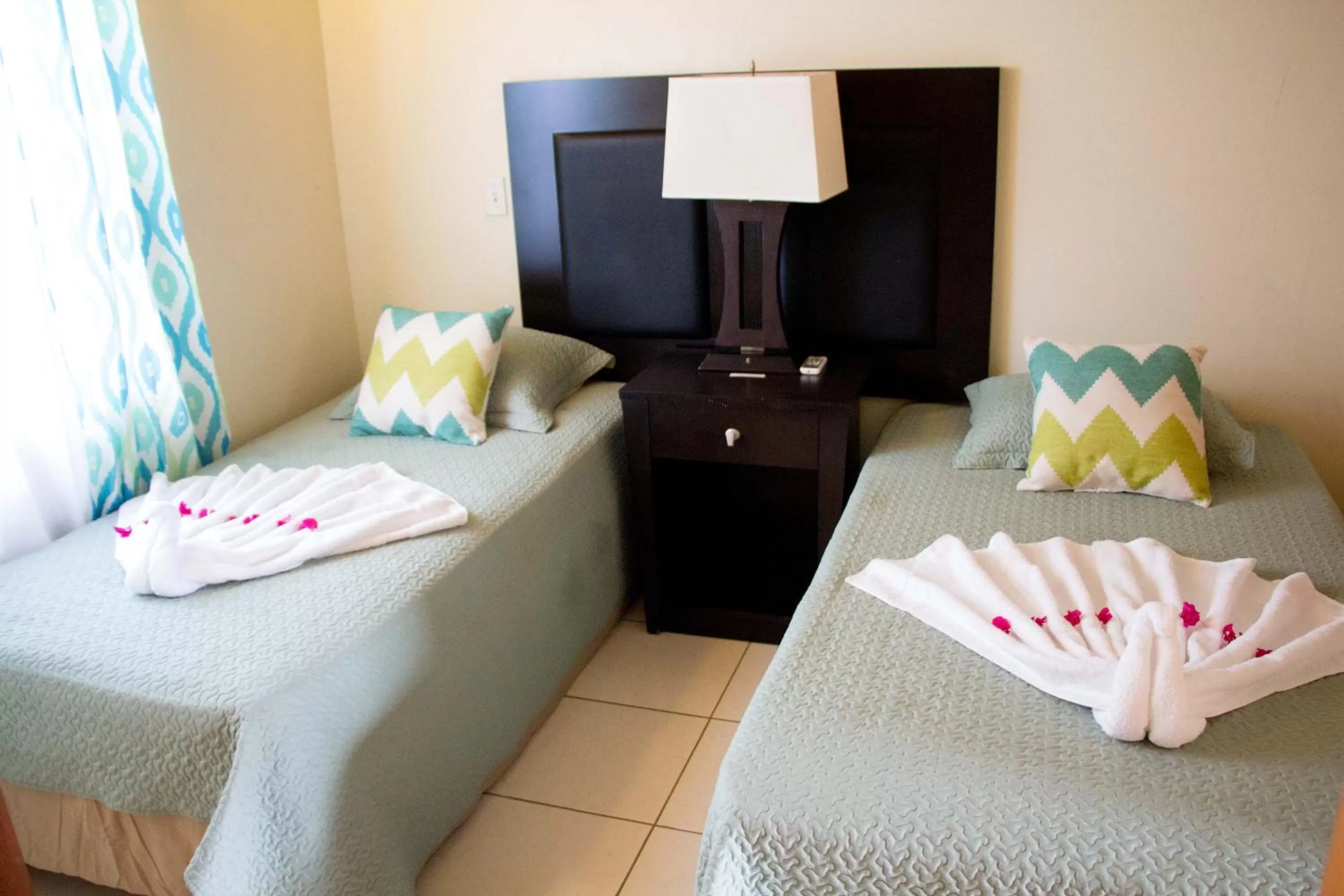 Bed in Connie's Comfort Suites