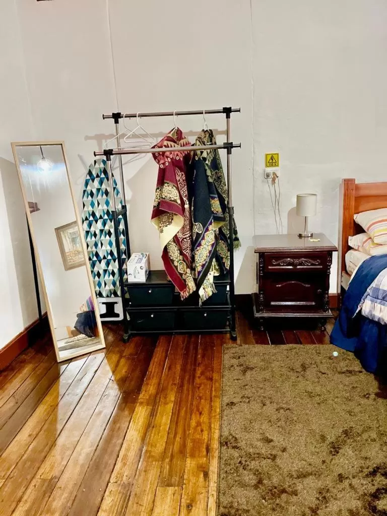 Bed in Blue Door Housing Historic Quito