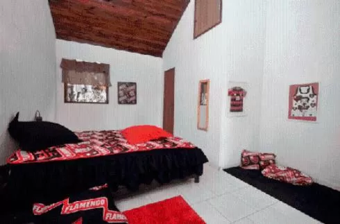 Bed in Pousada A Marca do Faraó