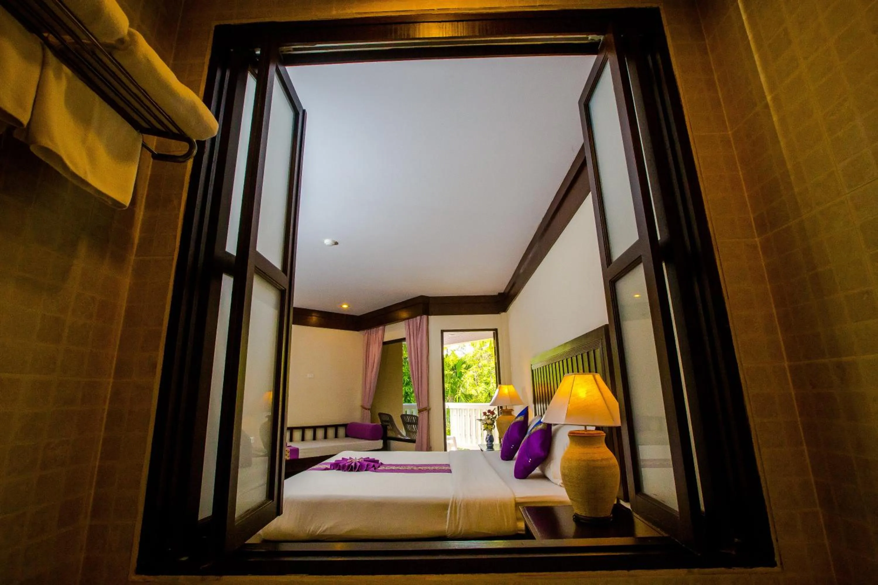 Bed in Kata Poolside Resort SHA Extra Plus