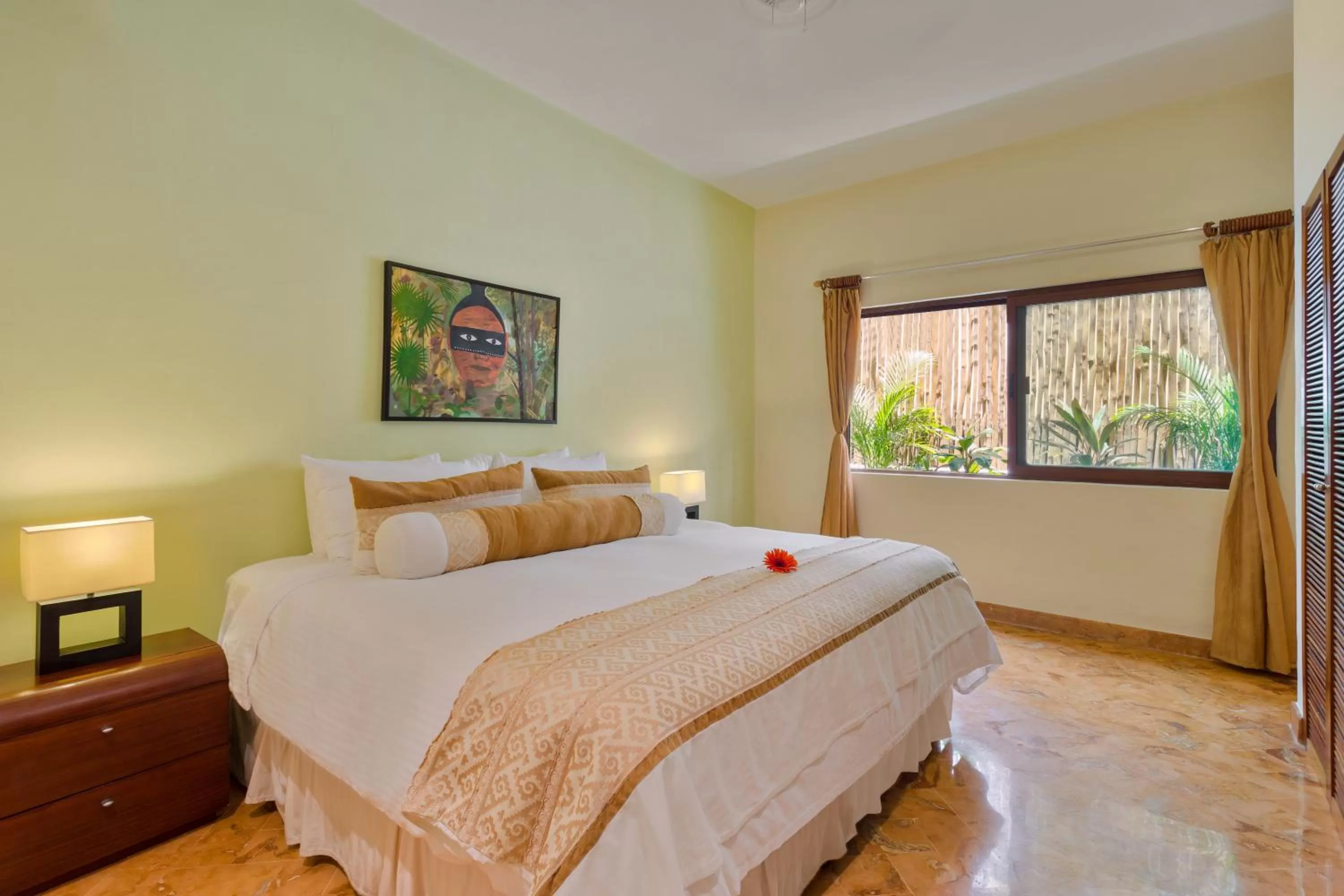 Bed in Porto Playa Condo Hotel and Beach Club