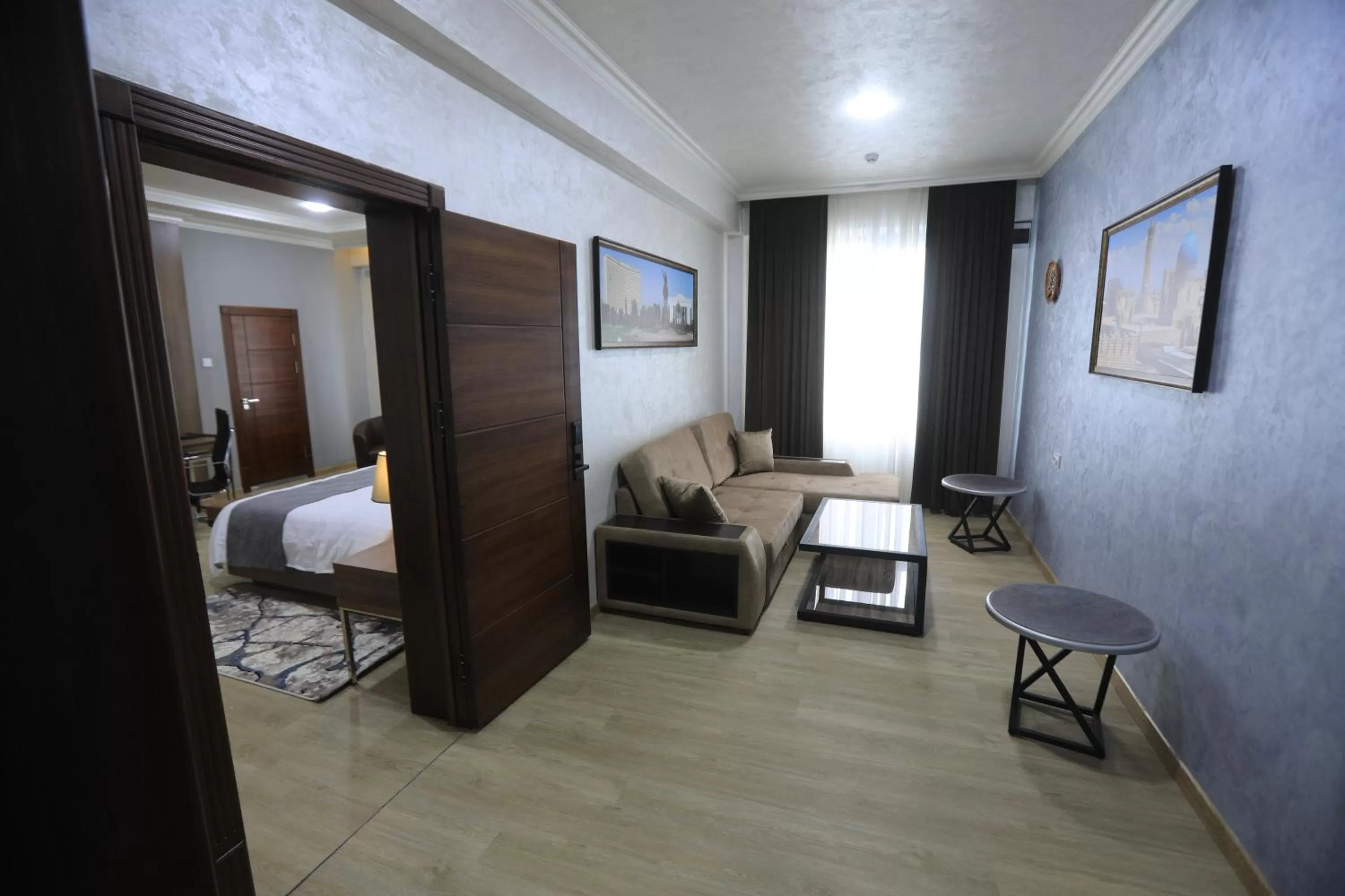 Living room, Bed in CHlNOR HOTEL