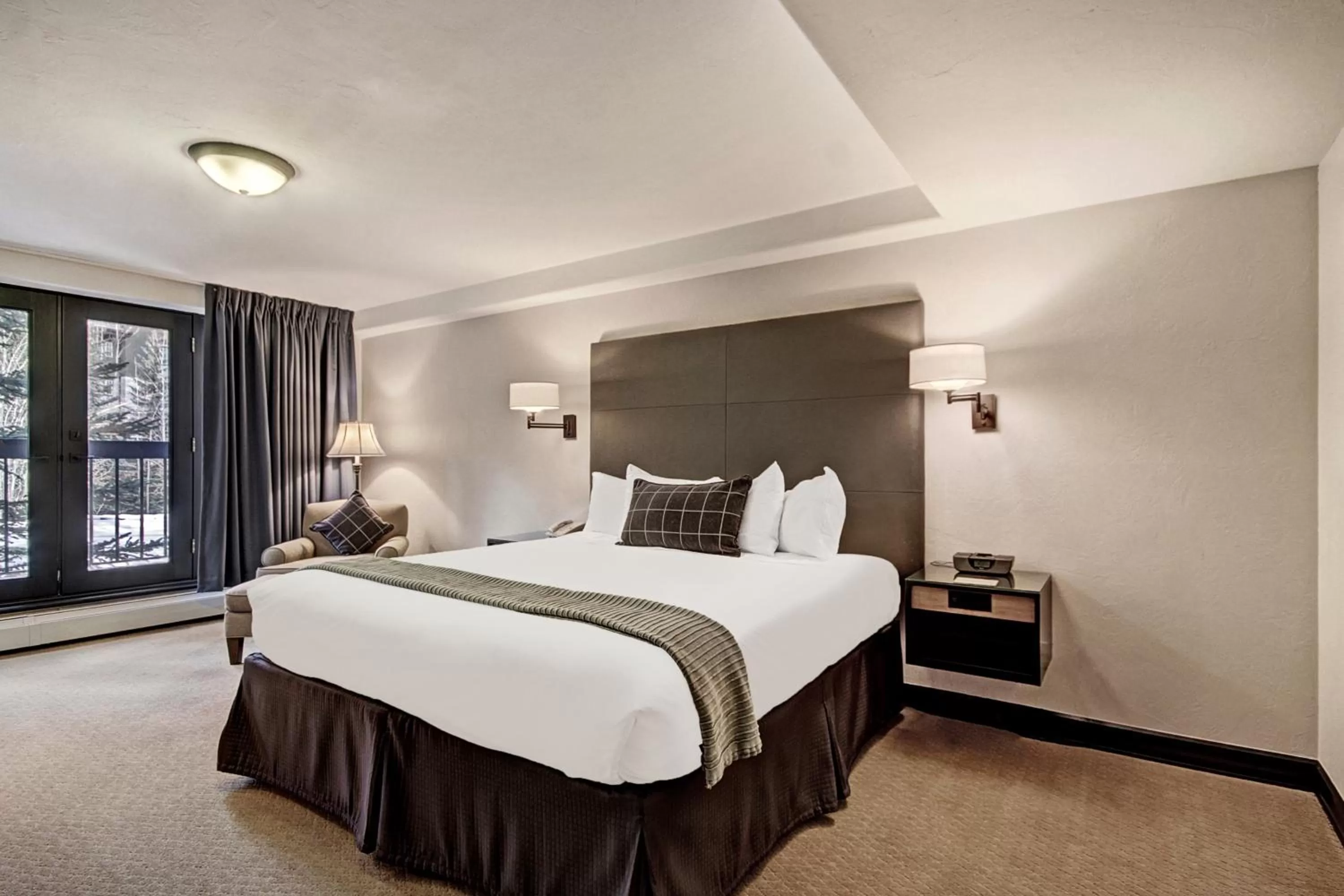 Bed in The Pines Lodge, a RockResort, by Vail Resorts