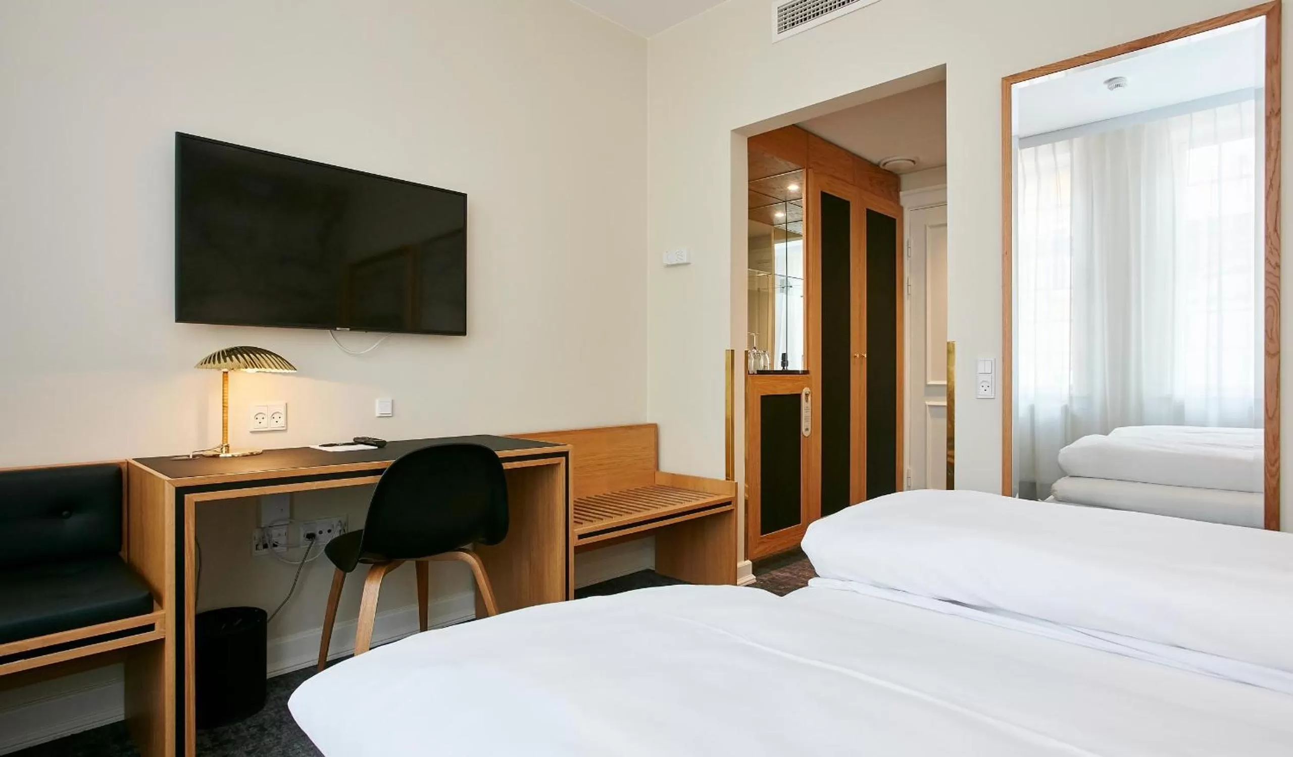 Bed in Jørgensens Hotel