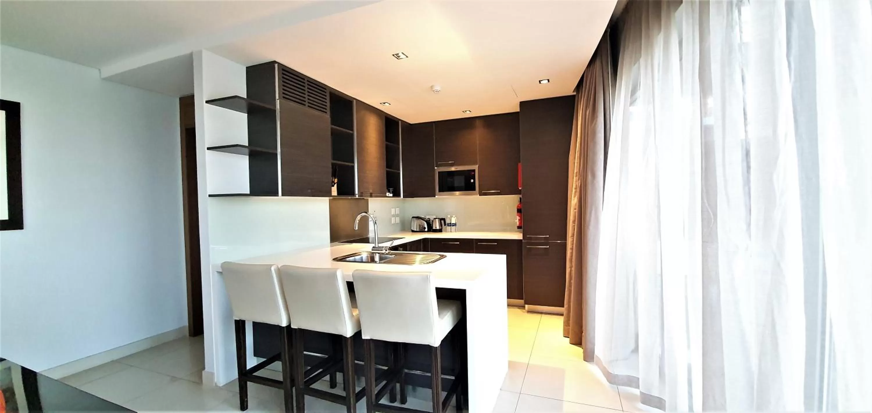 Kitchen or kitchenette in Majestic Arjaan by Rotana – Manama