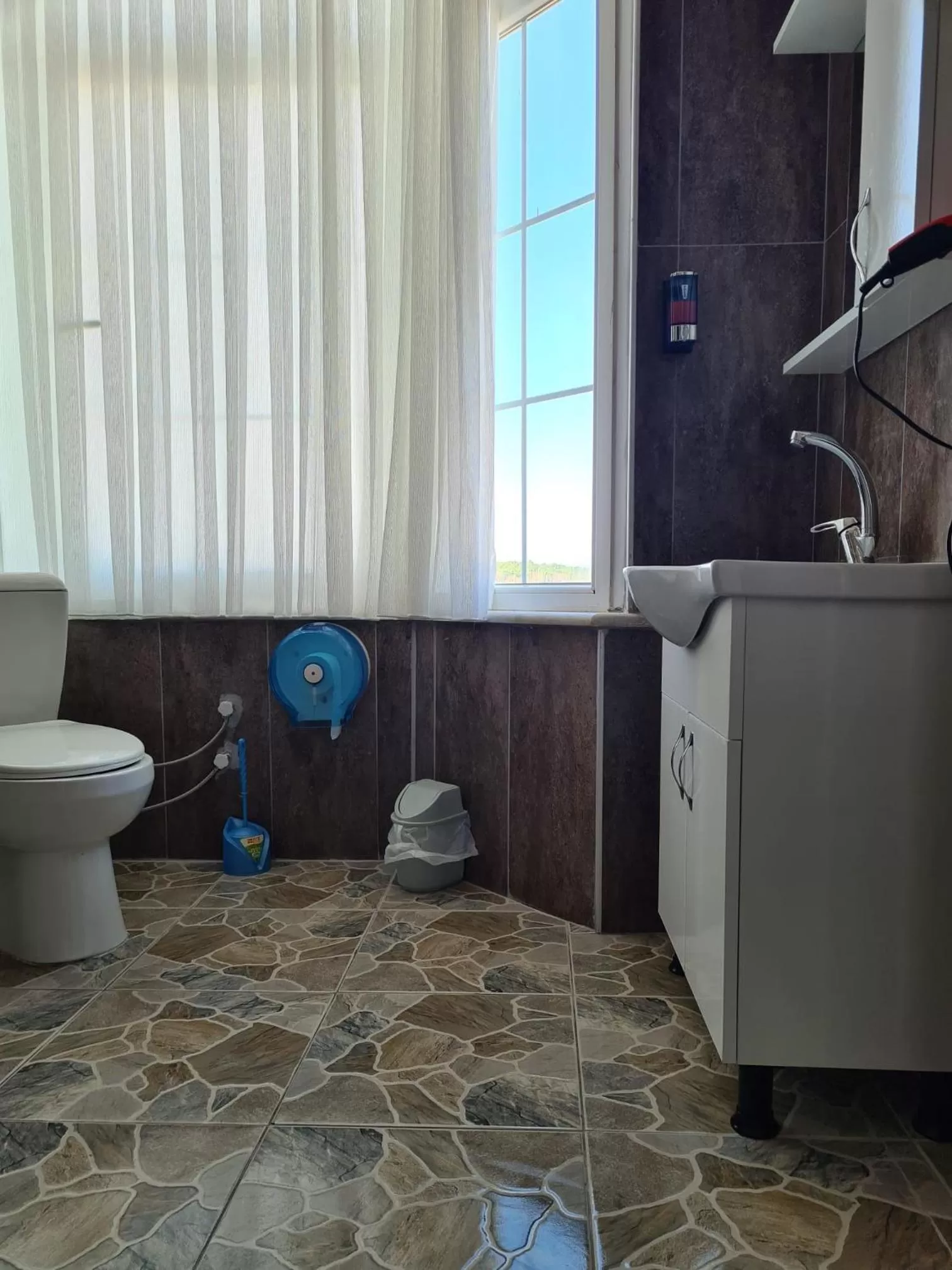 Toilet in Sword hotel