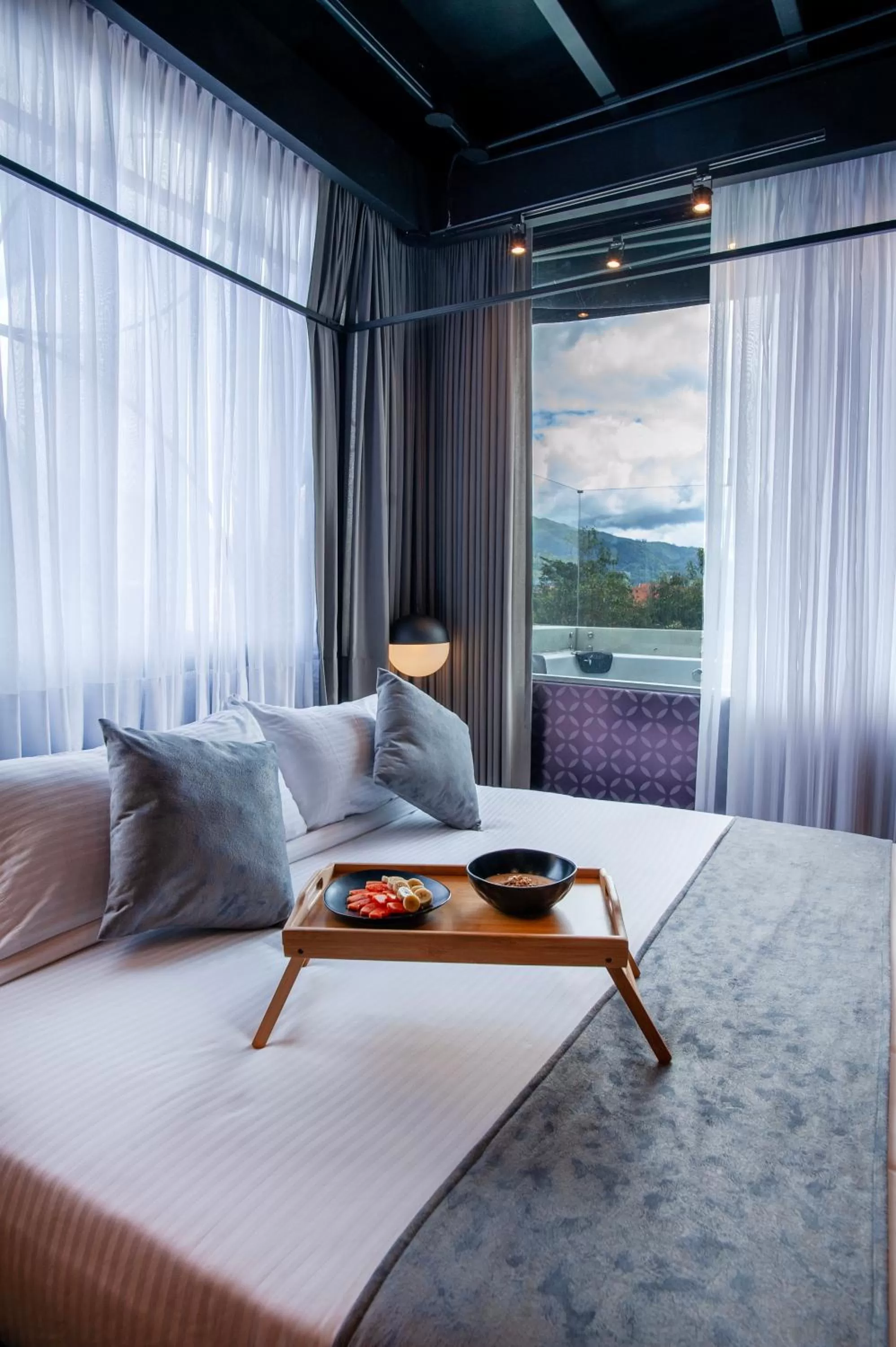 Bed in Hemma Bogotá Country Luxury Suites Hotel