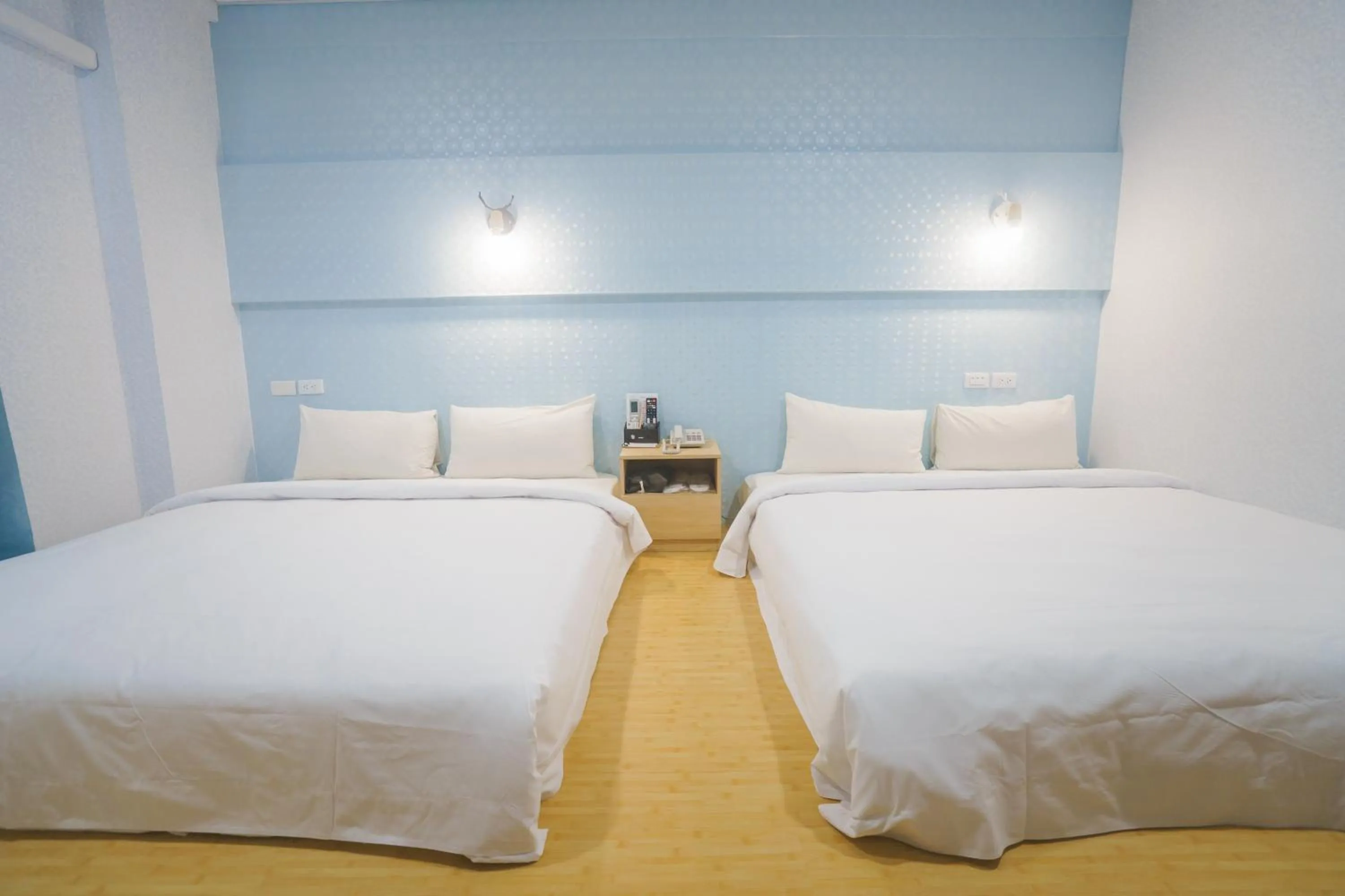 Bed in The Riverside Hotel Fashion