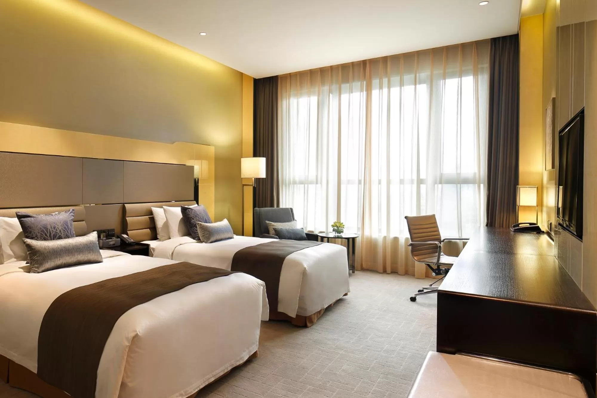 Bed in Crowne Plaza Beijing Lido by IHG