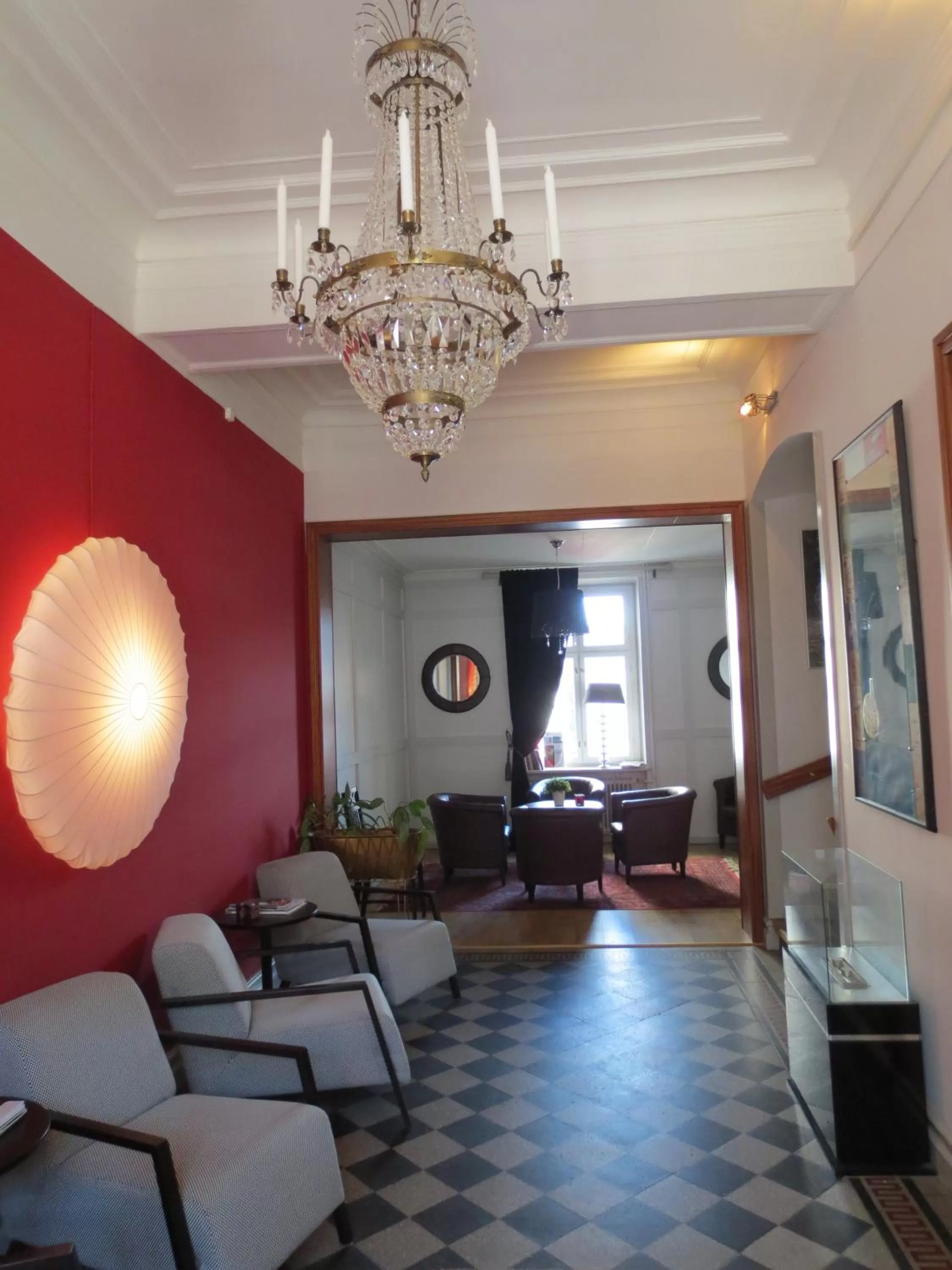 Communal lounge/ TV room in Arboga Stadshotell