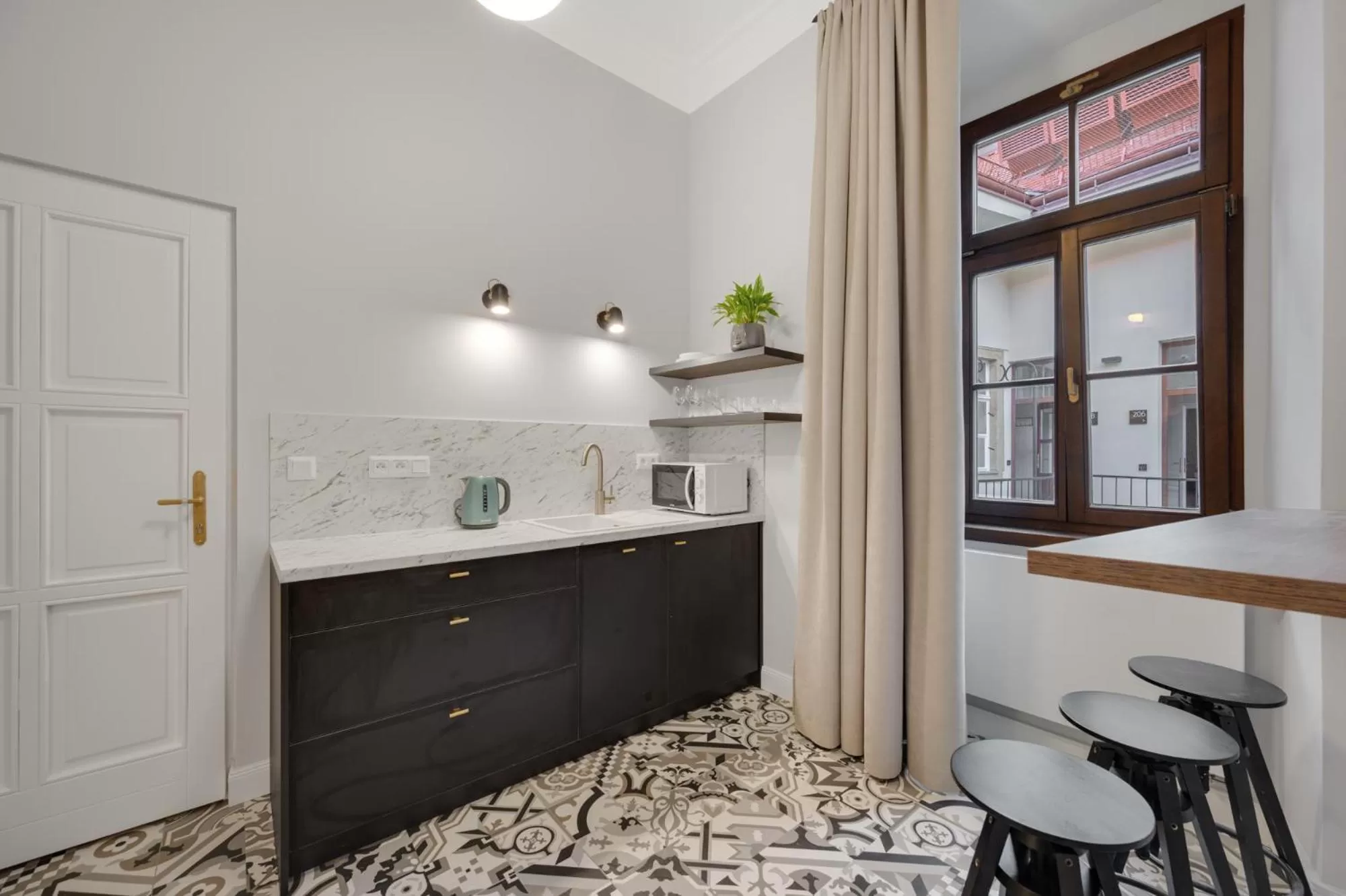 Kitchen or kitchenette in Palace Apartments