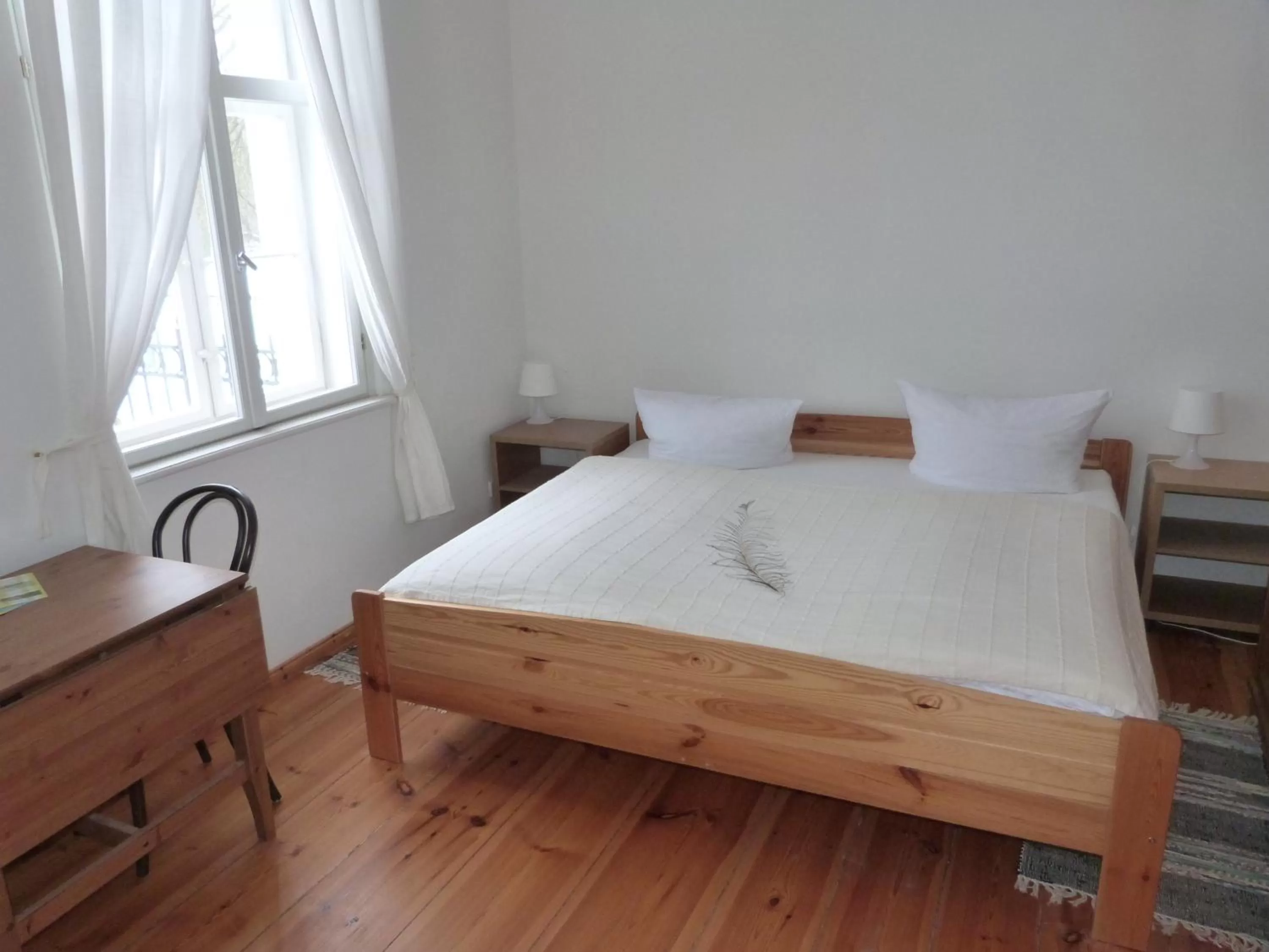 Bed in Gästehaus Schloss Plaue