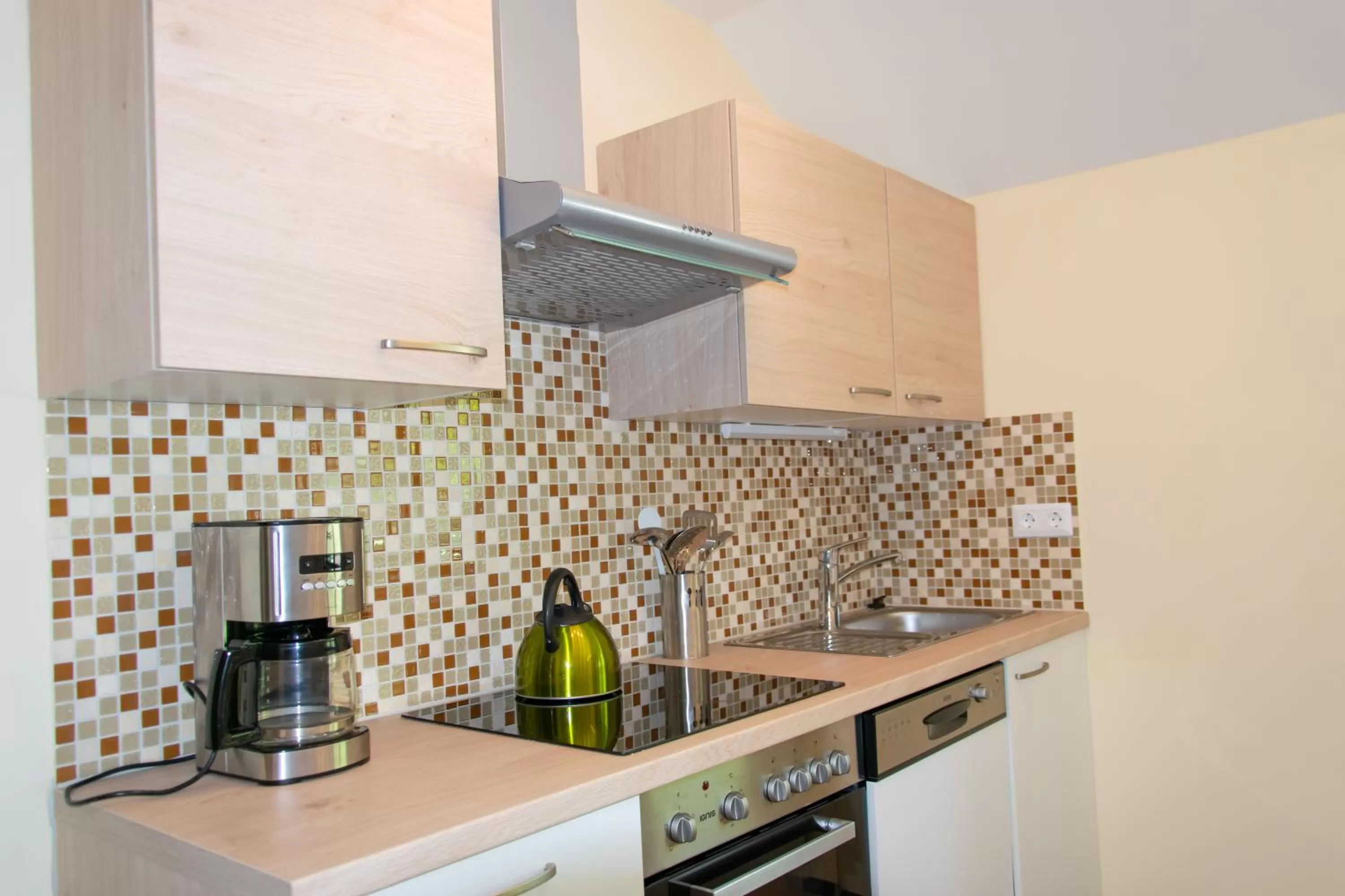 Kitchen or kitchenette in Strandhotel Burgstaller