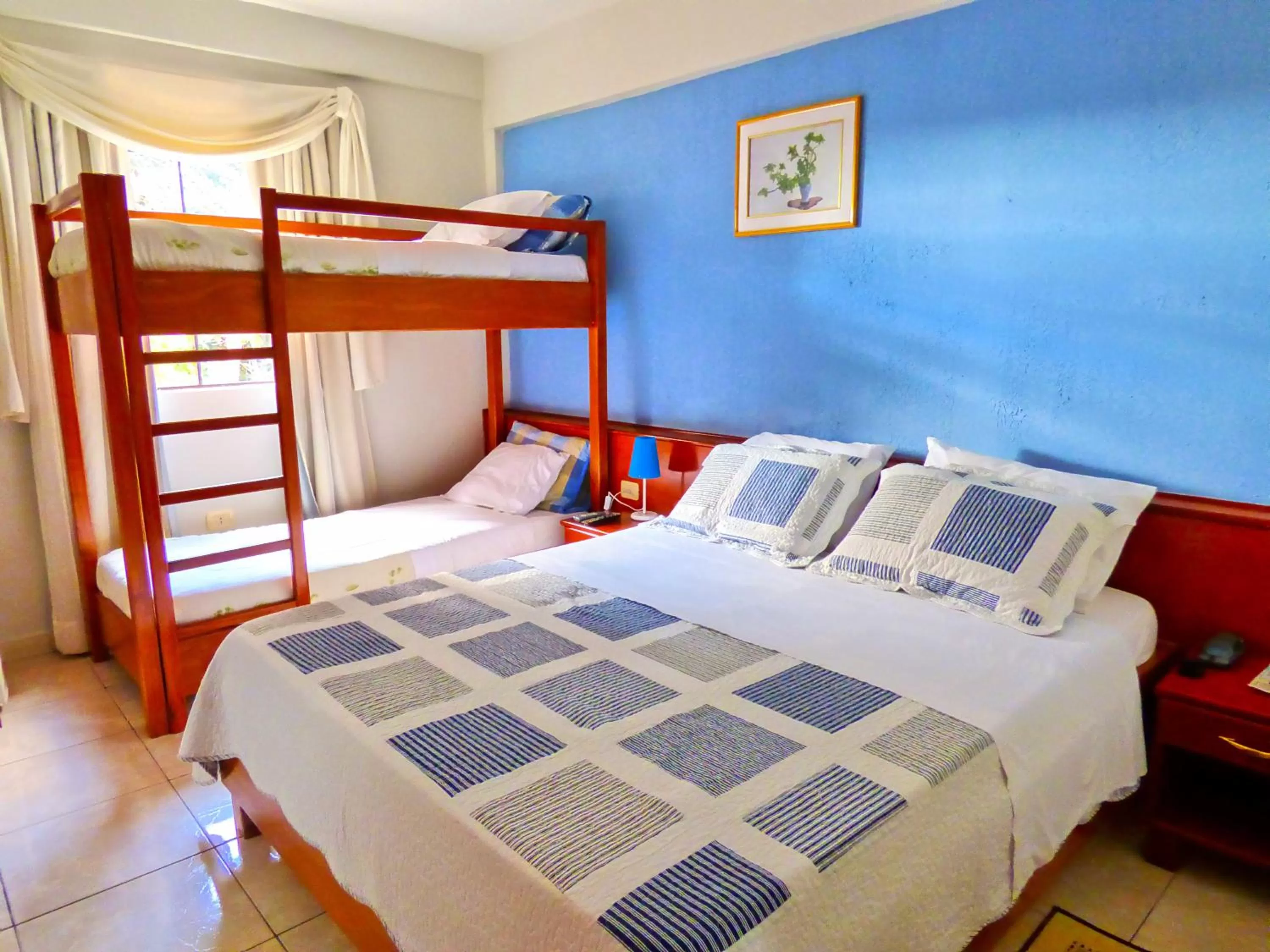 Photo of the whole room, Bed in De La Costa Hotel