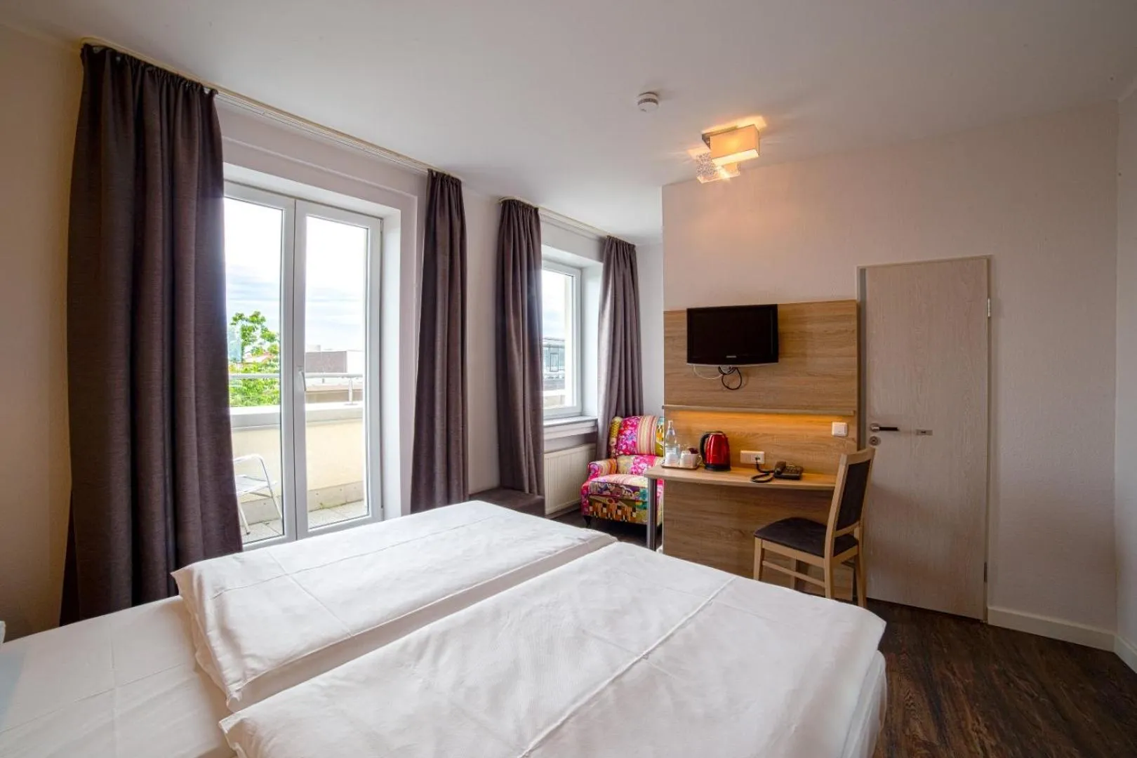 Photo of the whole room, Bed in City Hotel Hannover