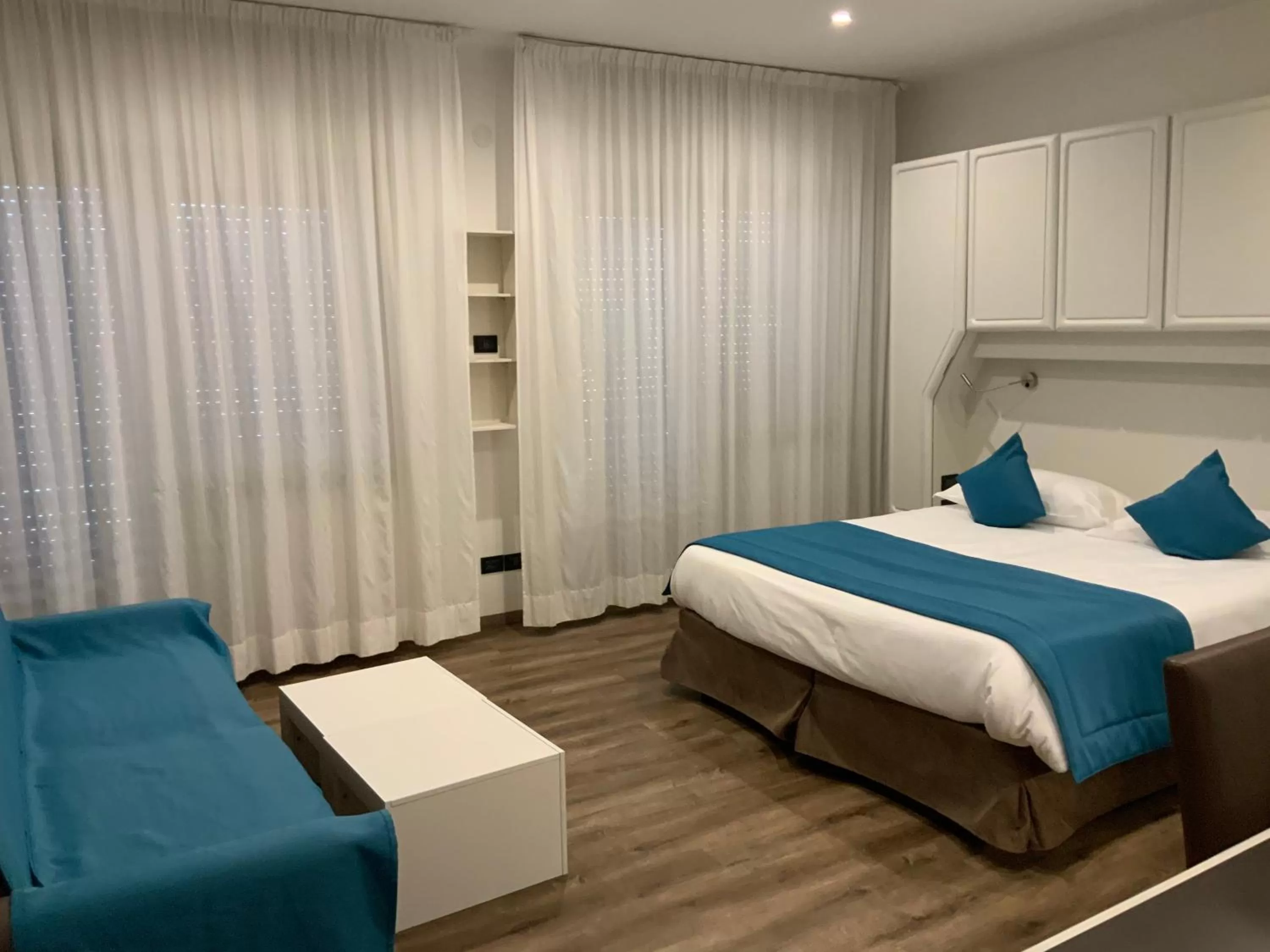 Bed in Albergo Cappello e Cadore