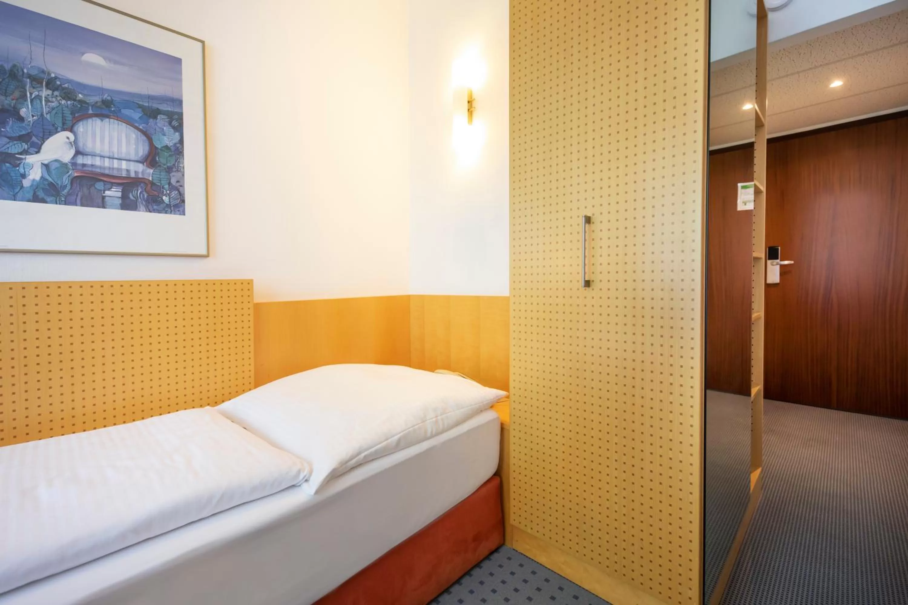 Photo of the whole room, Bed in ACHAT Hotel Suhl