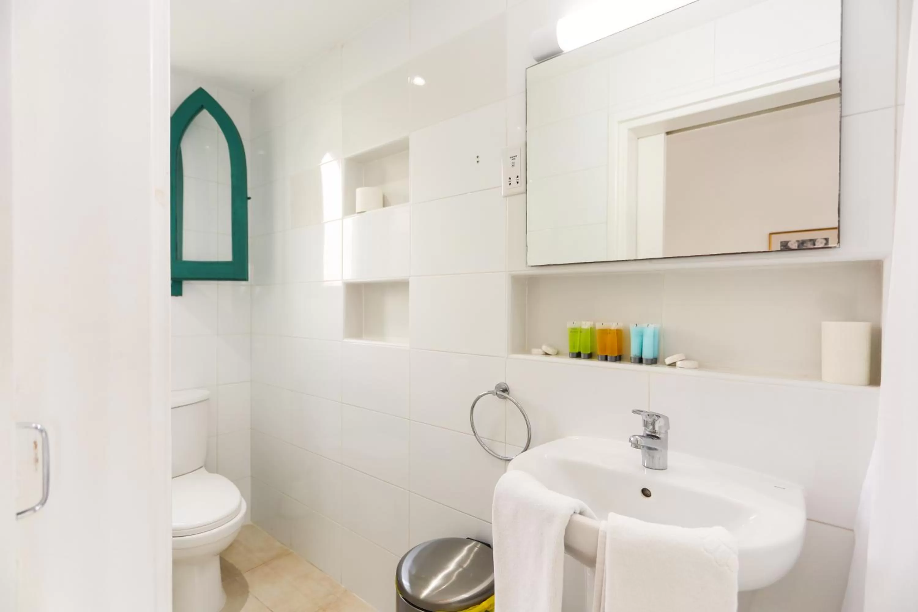 Toilet in Axiothea Hotel