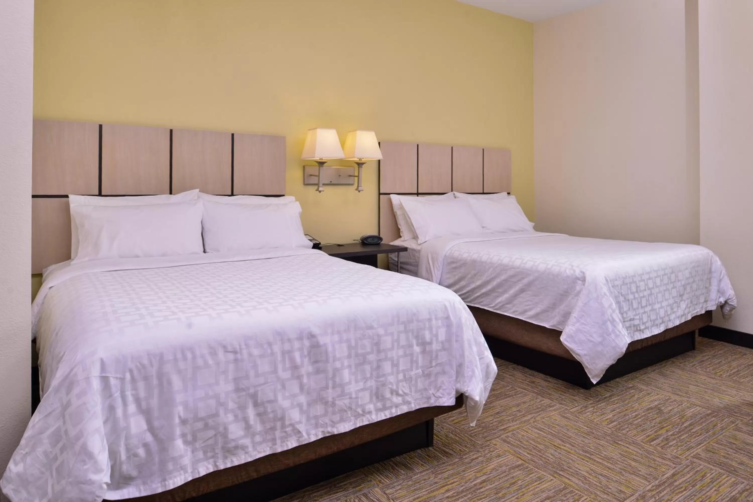 Photo of the whole room, Bed in Candlewood Suites Terre Haute by IHG
