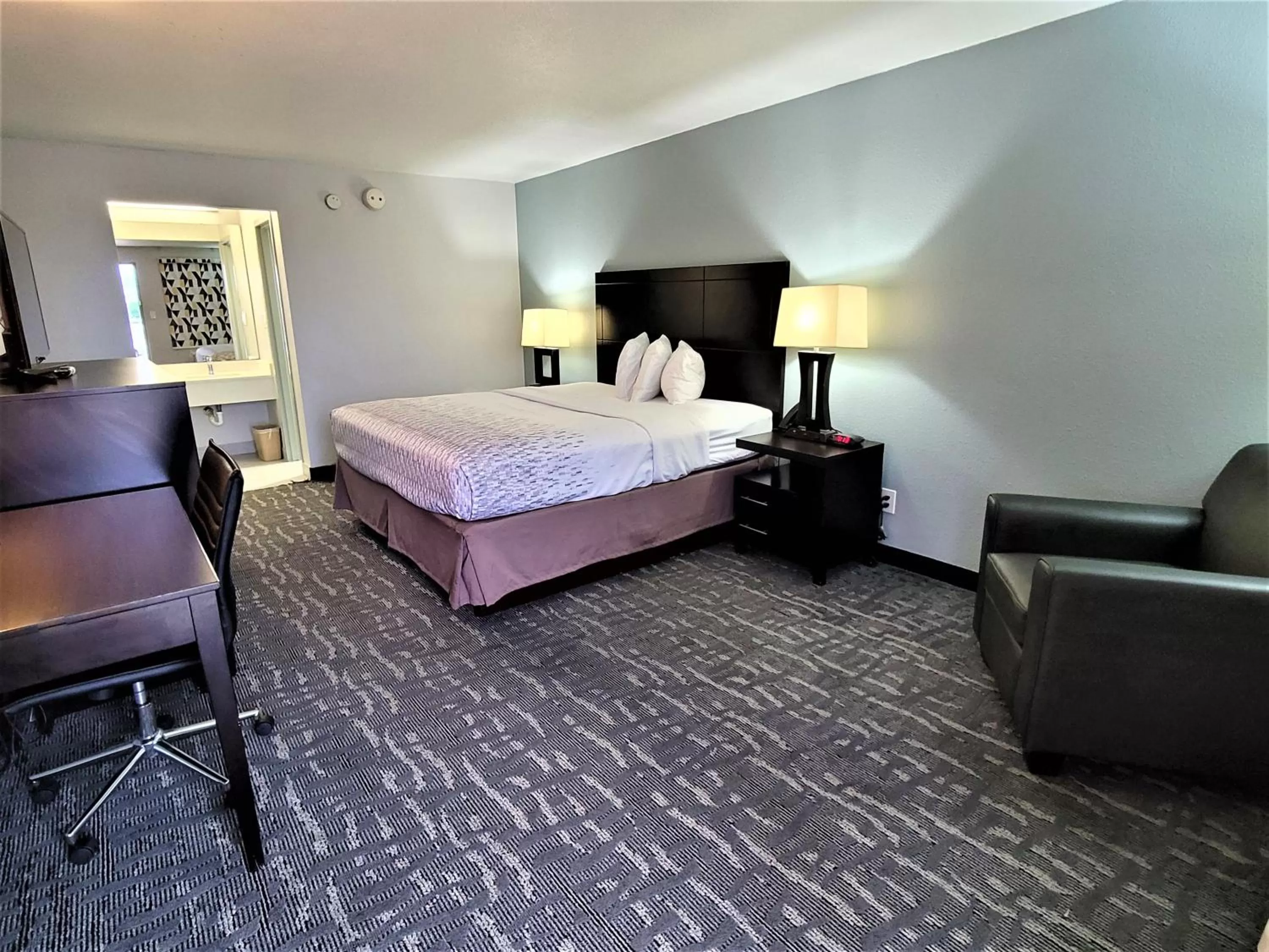 Bed in Inn Of Rockwall