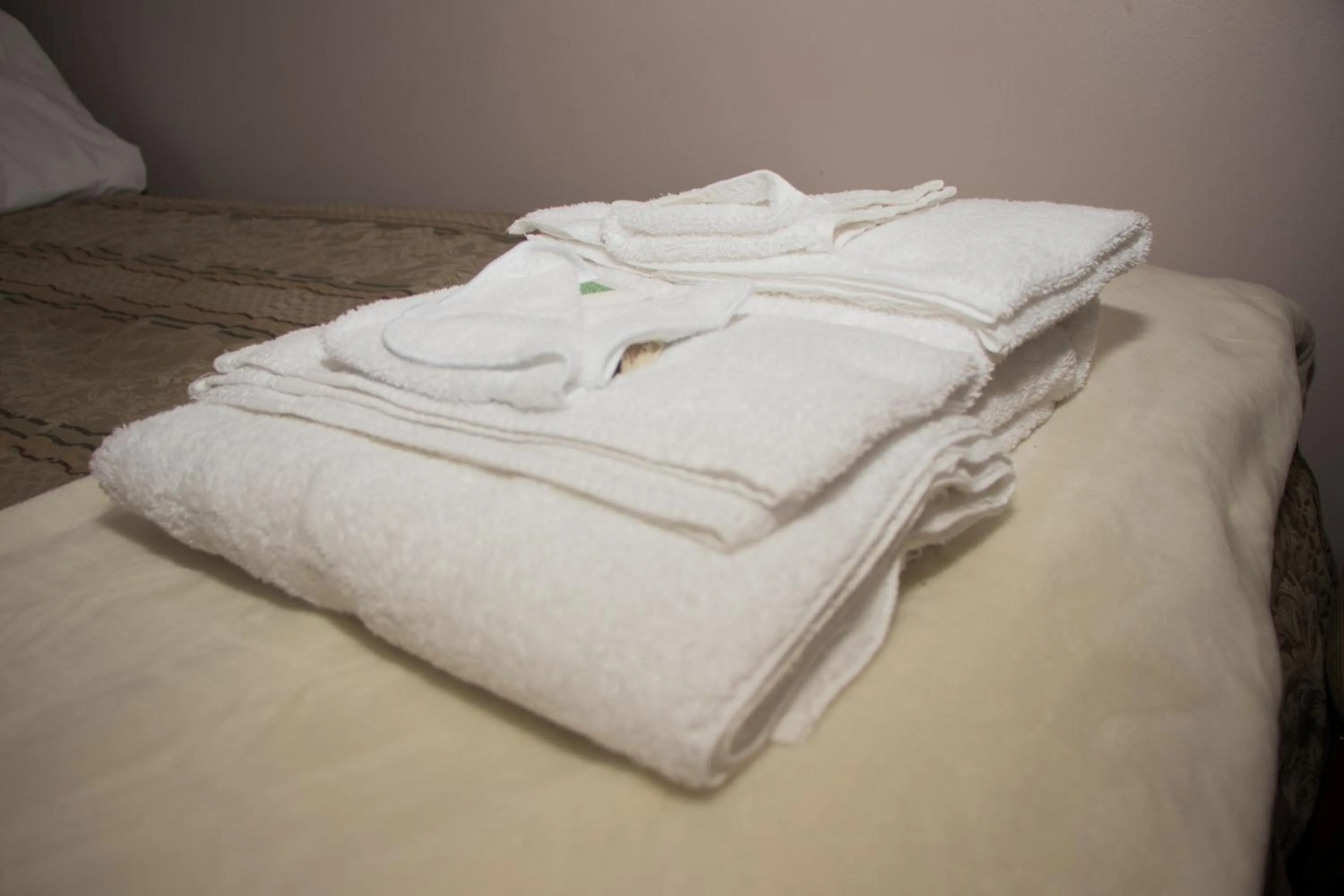 towels, Bed in Saint Lawrence Residences and Suites