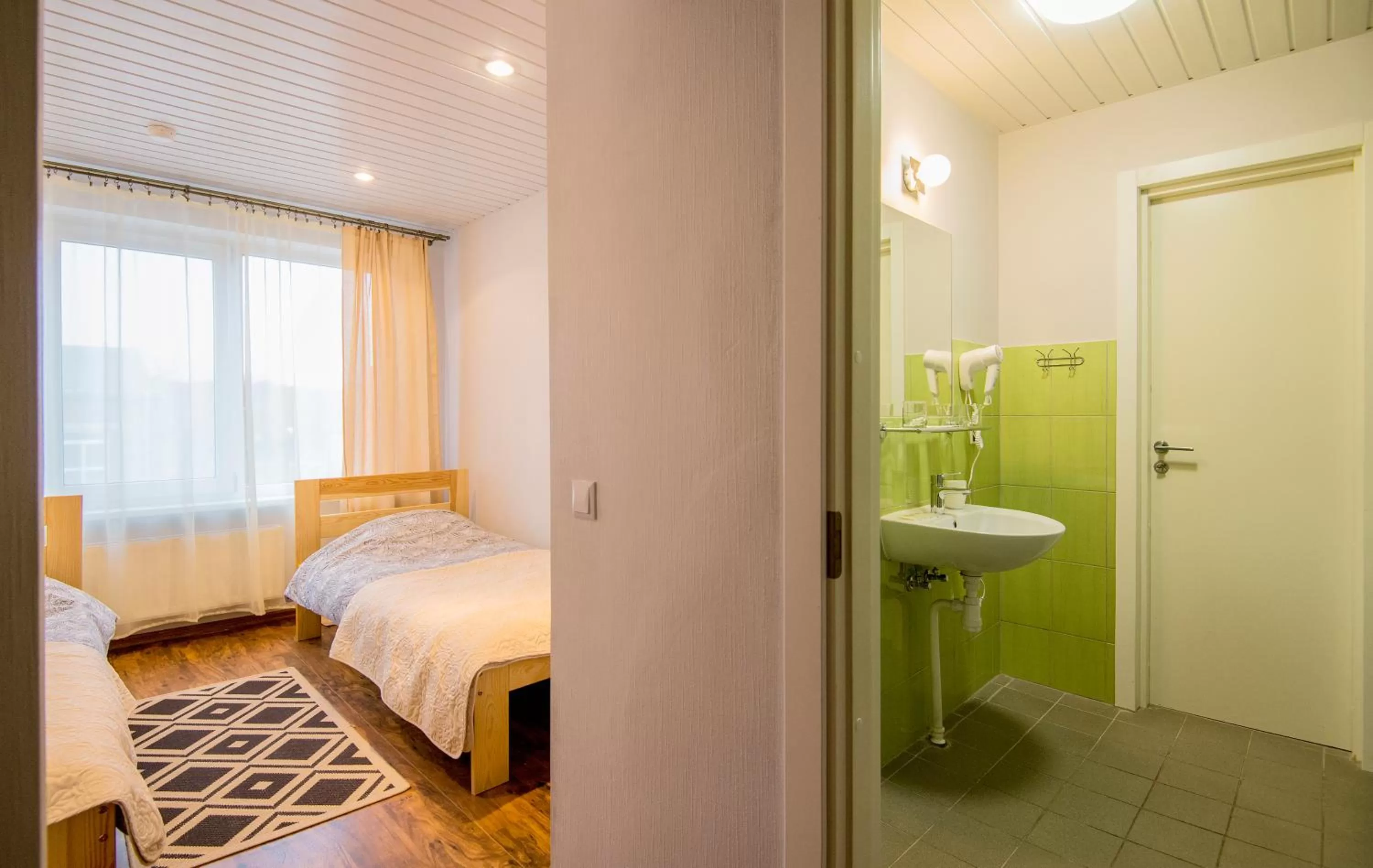 Shower, Bed in Hotel Mezaparks