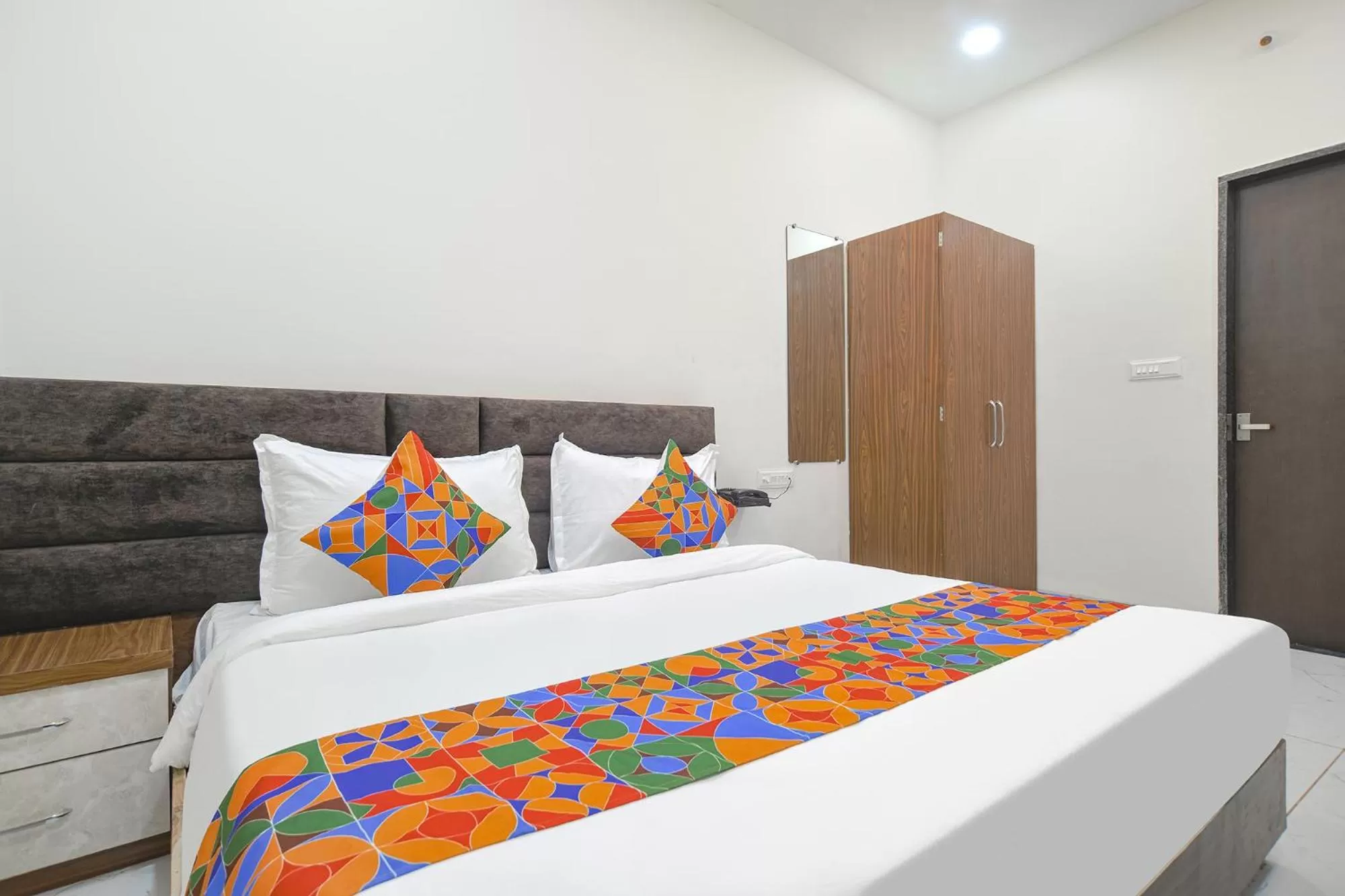 Bed in FabHotel Ramya