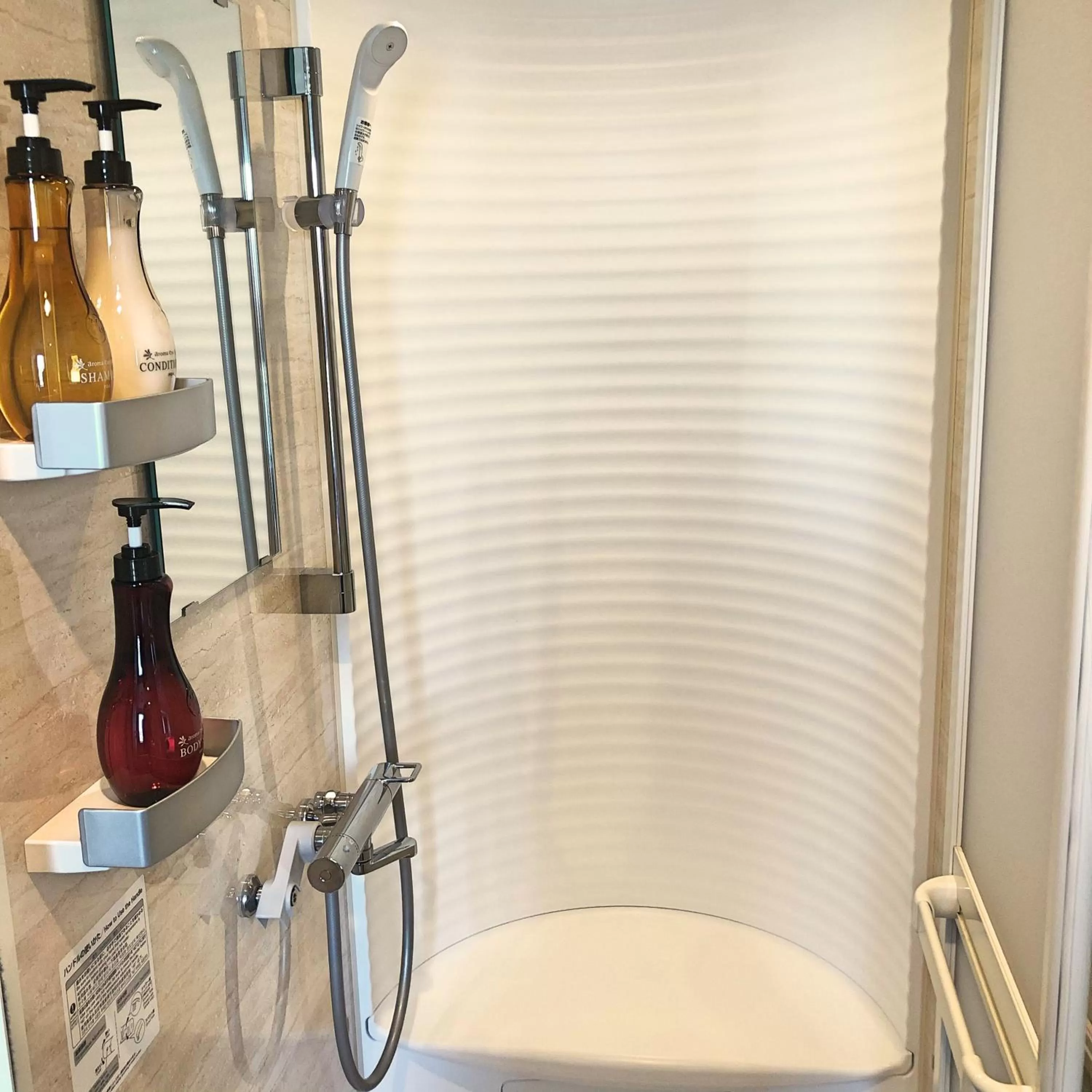 Shower in La Vista Furano Hills Natural Hot Spring