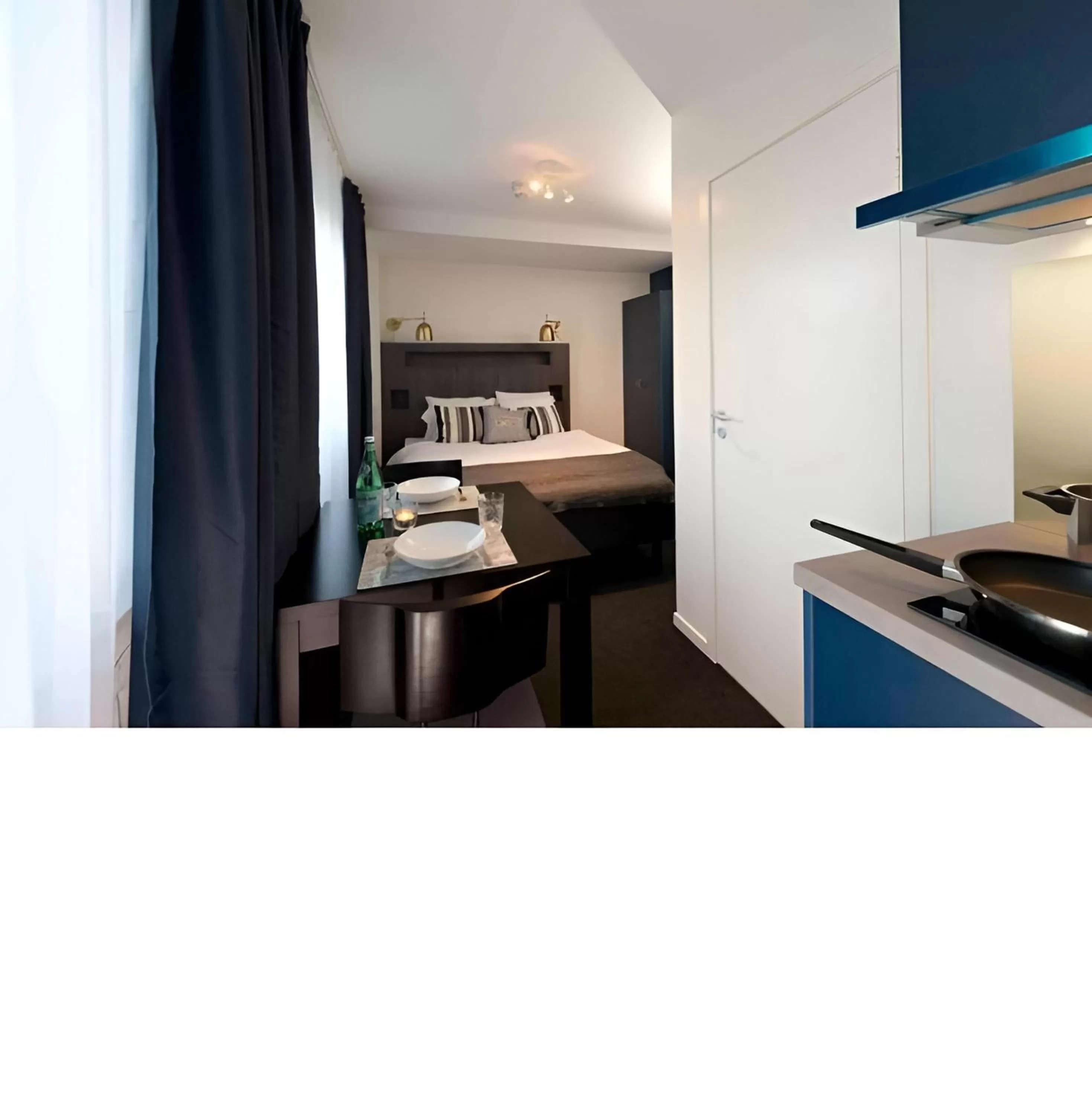 Bed in Communia Hotel Residence