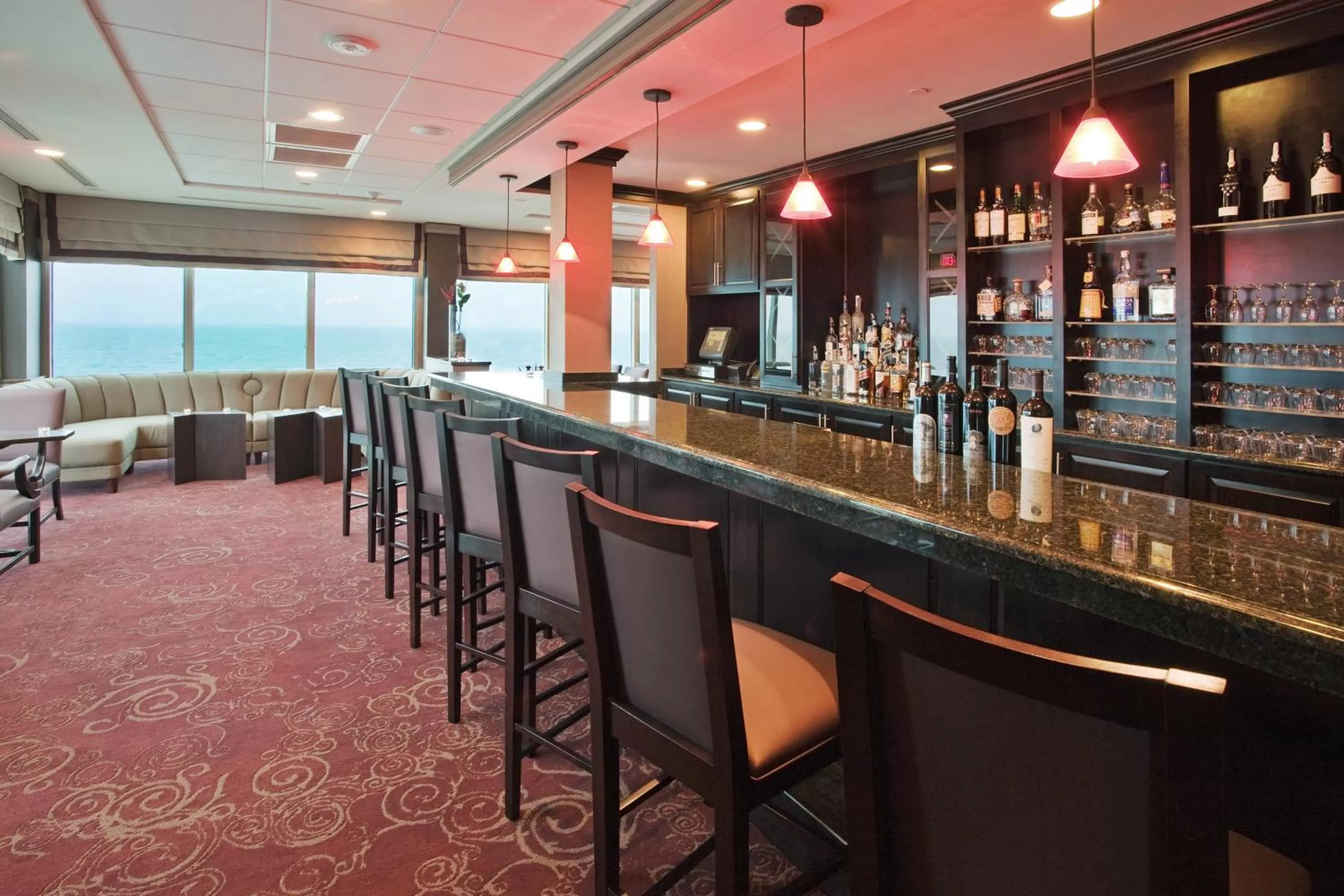 Lounge or bar in Holiday Inn & Suites Virginia Beach - North Beach by IHG