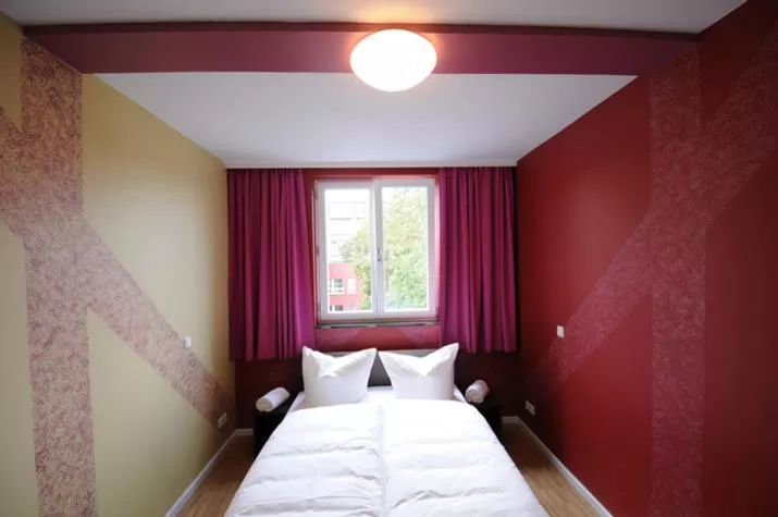 Photo of the whole room, Bed in HOLI-Berlin Hotel