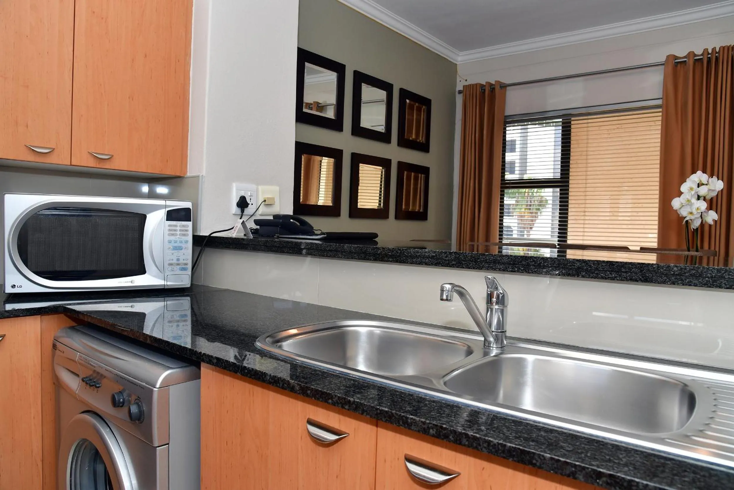 Kitchen or kitchenette in WeStay Westpoint Apartments