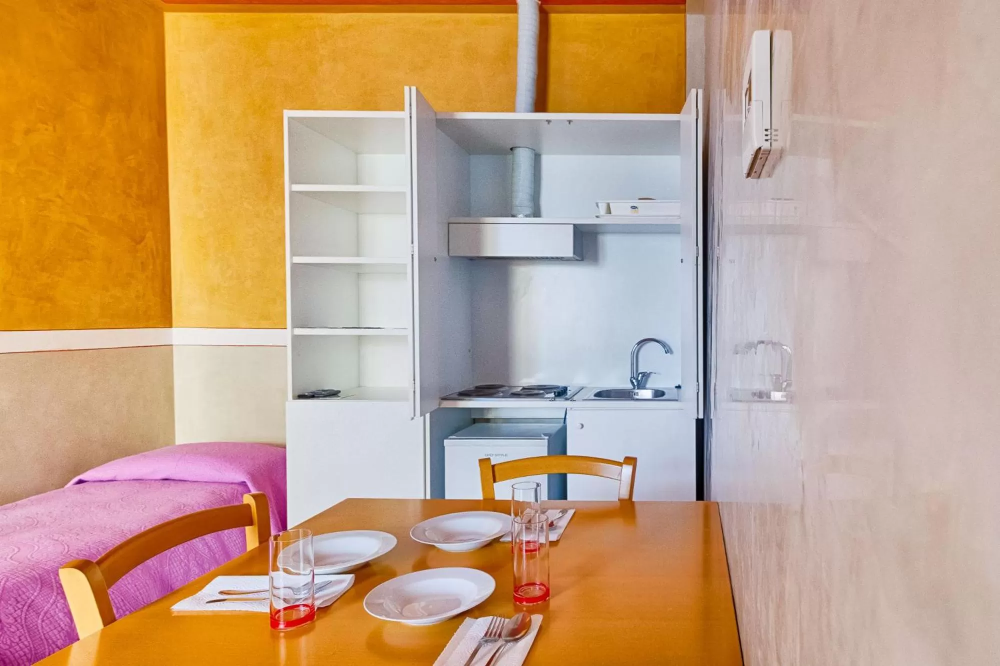 Communal lounge/ TV room, Kitchen/Kitchenette in Lloyd Residence Triestino