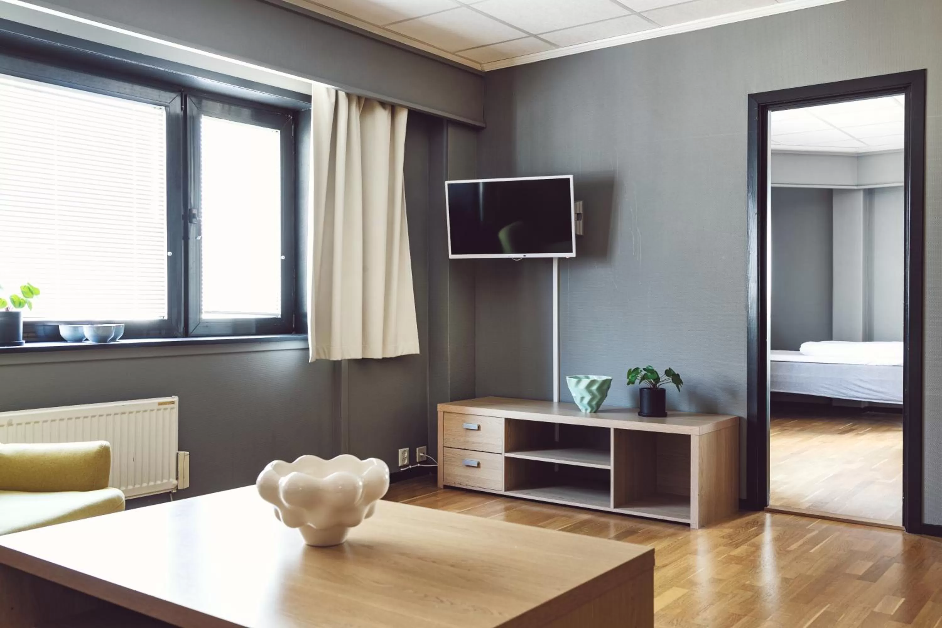 Seating area, Bed in Hotel Haugesund