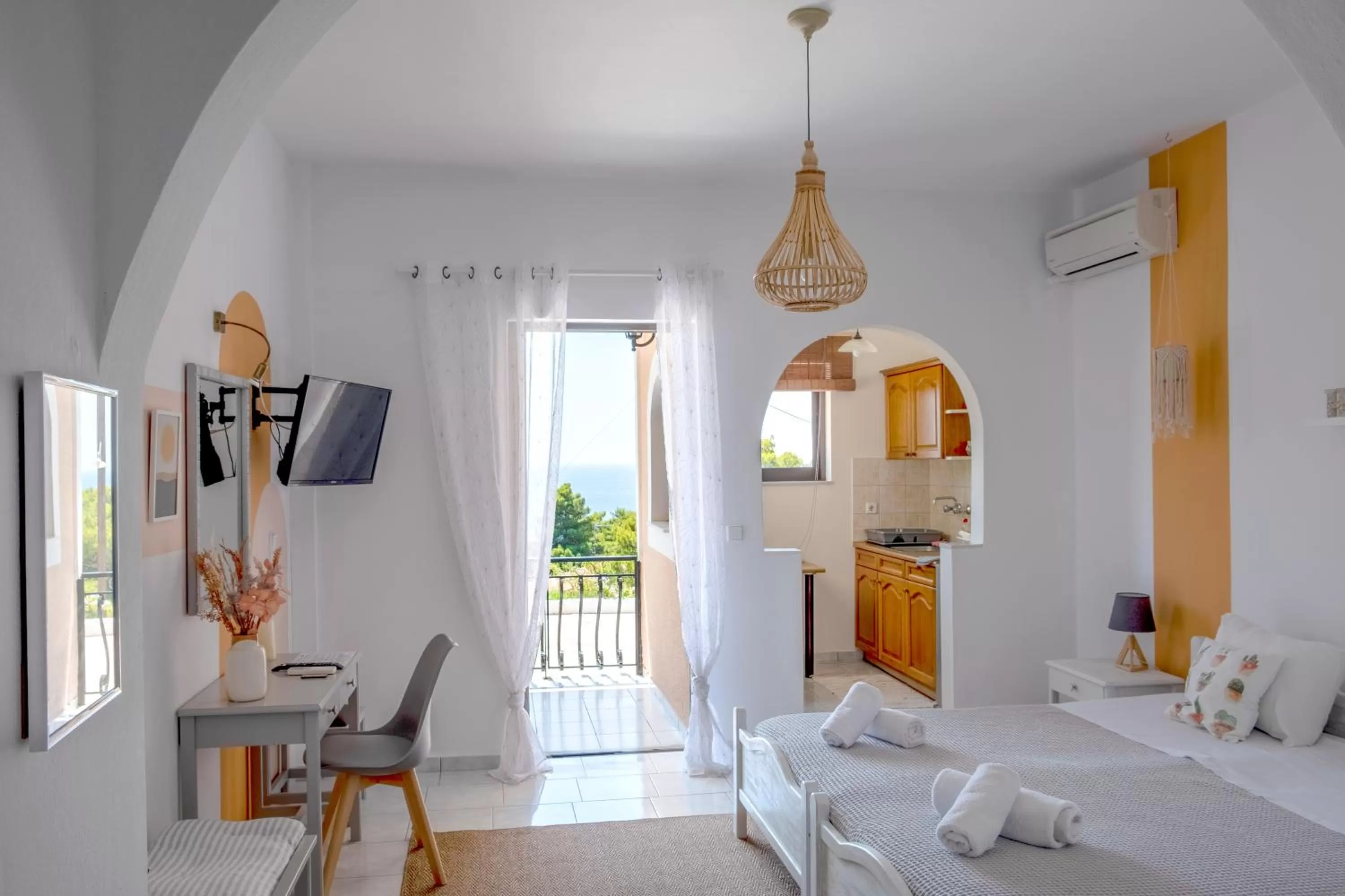 Photo of the whole room in Pefkides Aegina Boutique Apartments