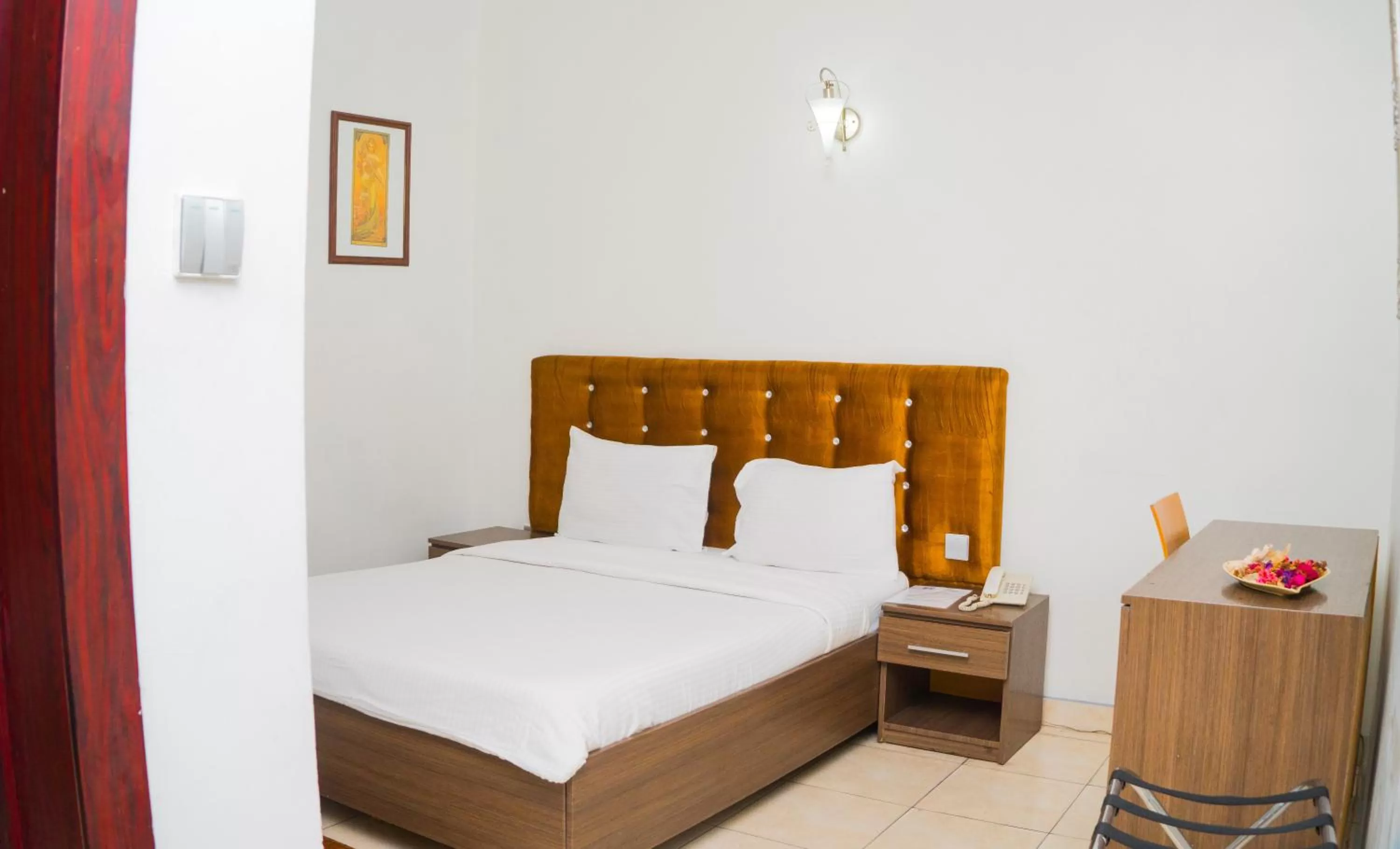 Bed in 1804 Boutique Hotel