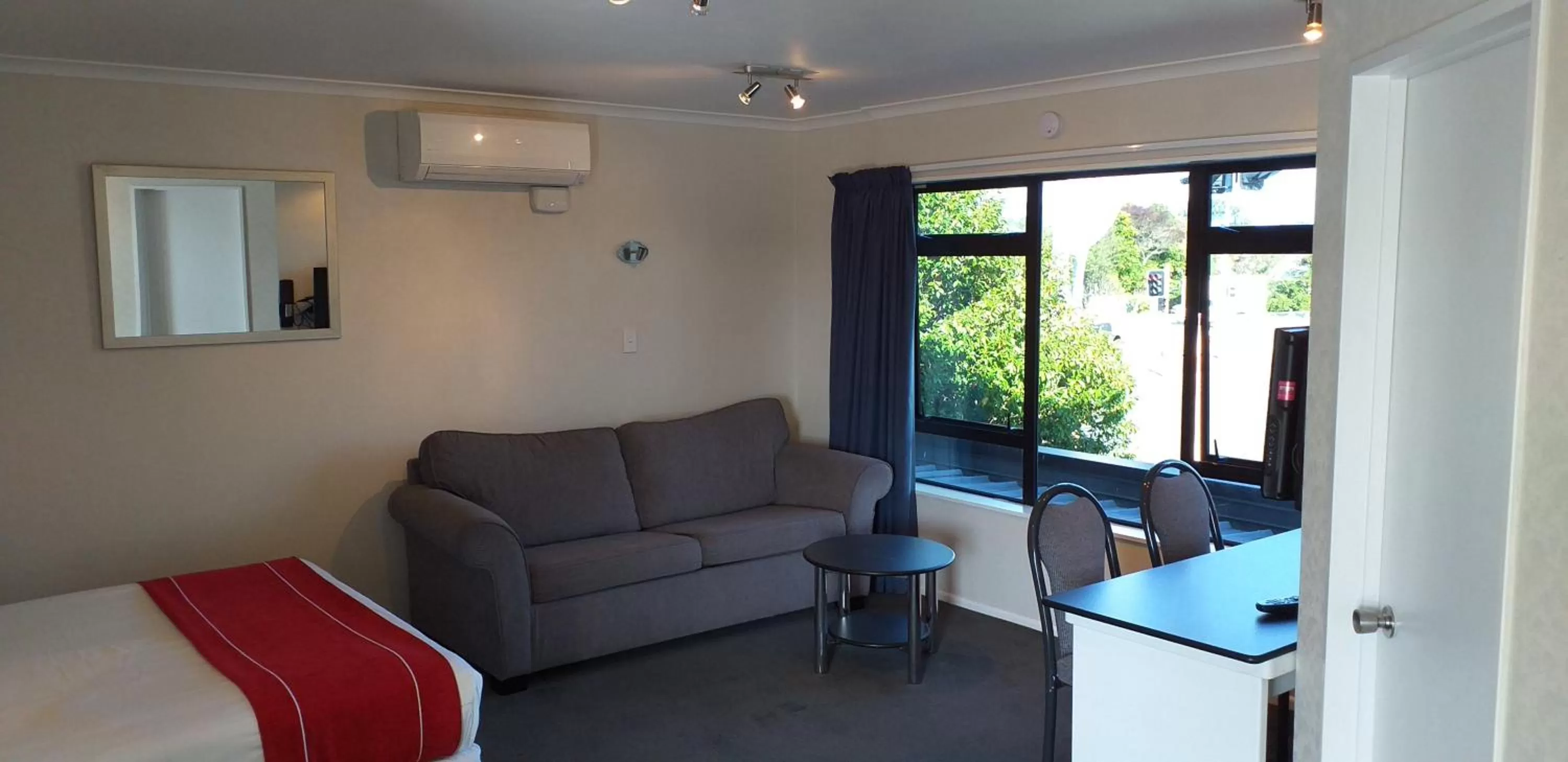 Seating area, Bed in Shadzz Motel