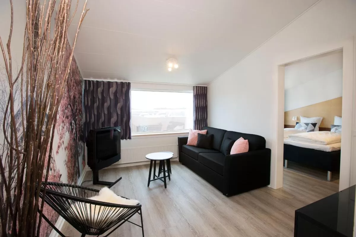 Living room, Bed in Hotel Hedegaarden