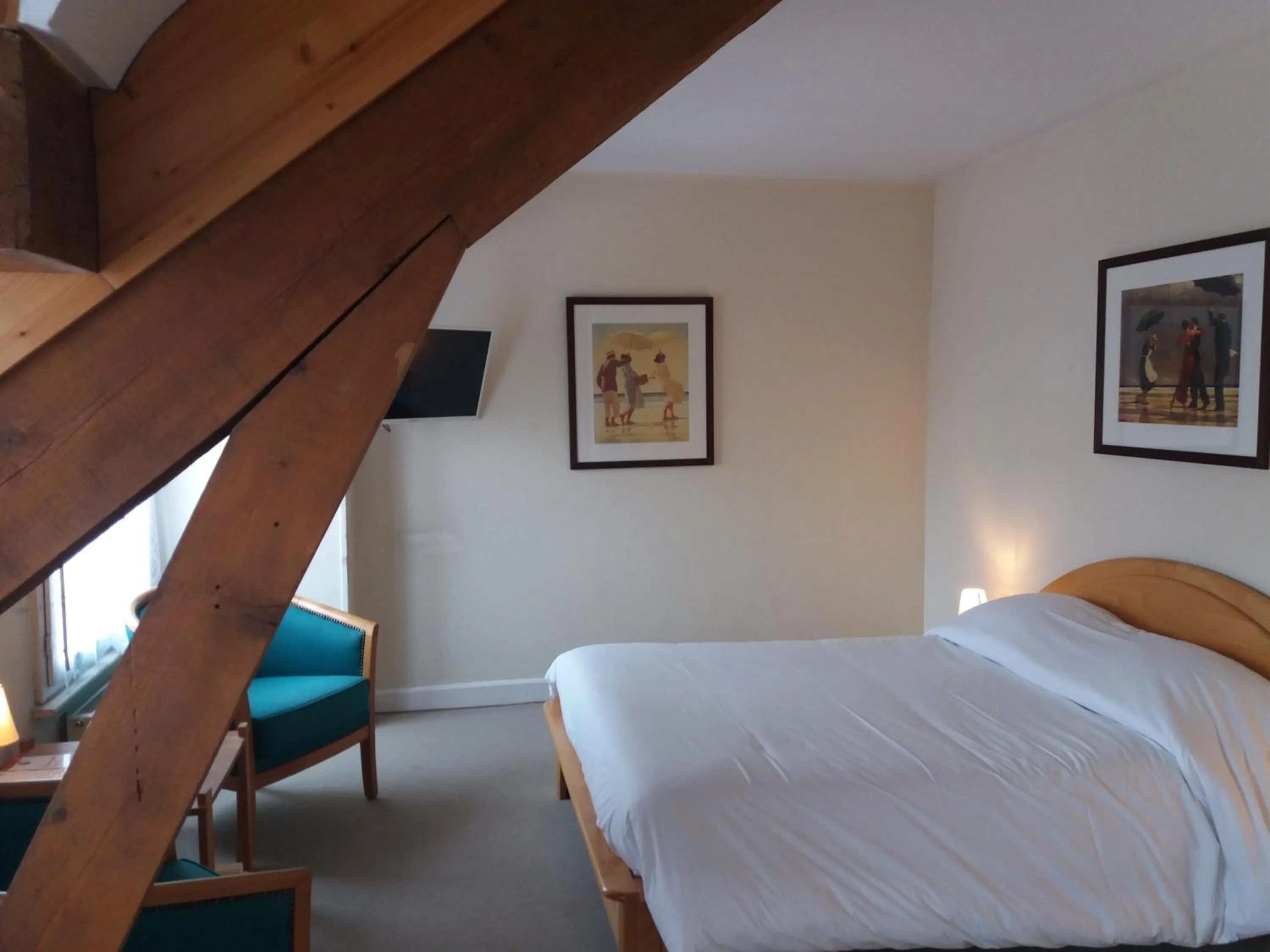 Bed in Hôtel De La Paix