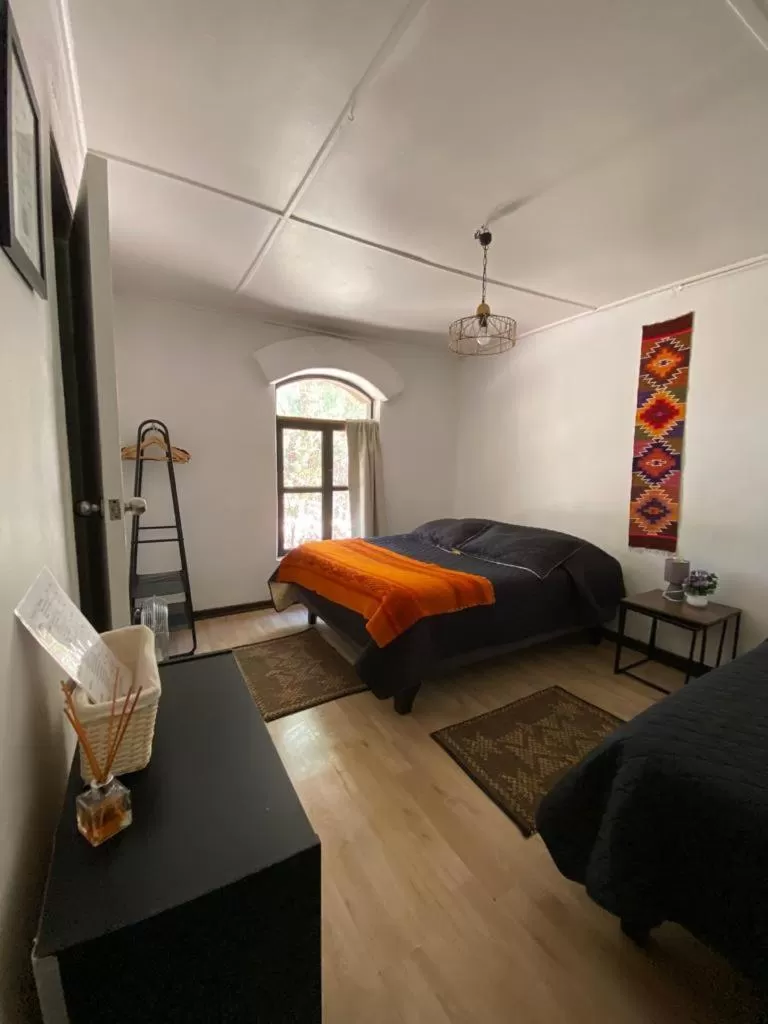 Photo of the whole room, Bed in CaminAndes Hostal