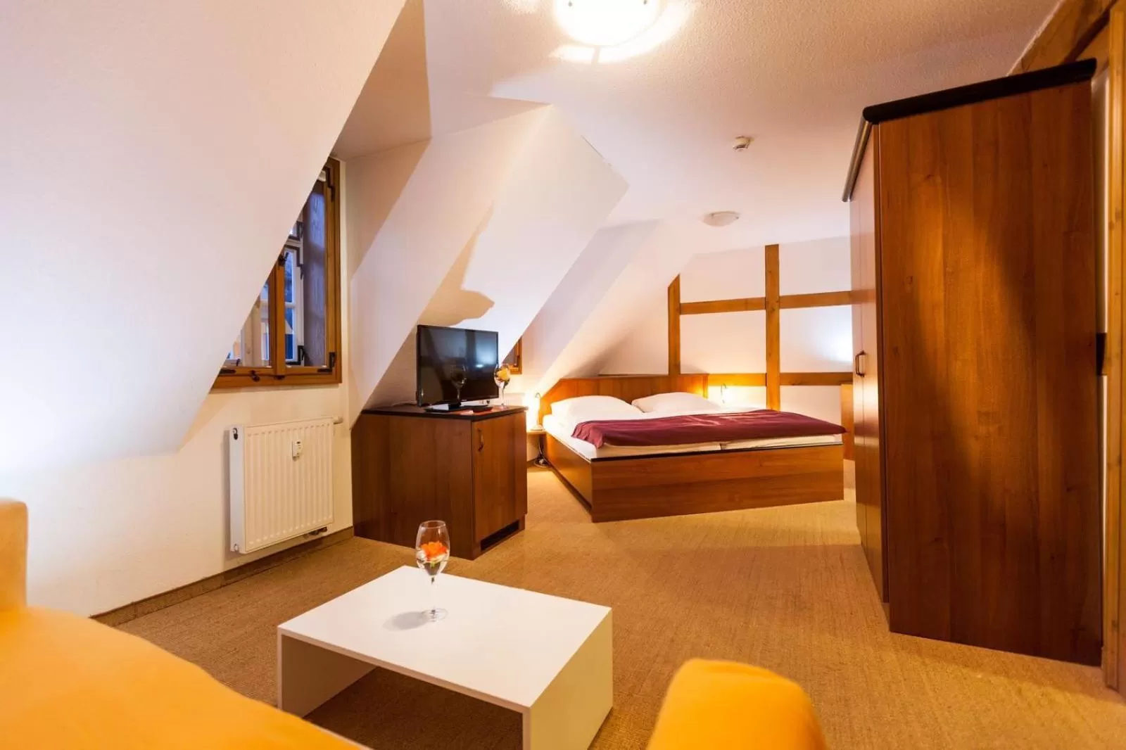 Communal lounge/ TV room, Bed in Hotel Haus im Sack