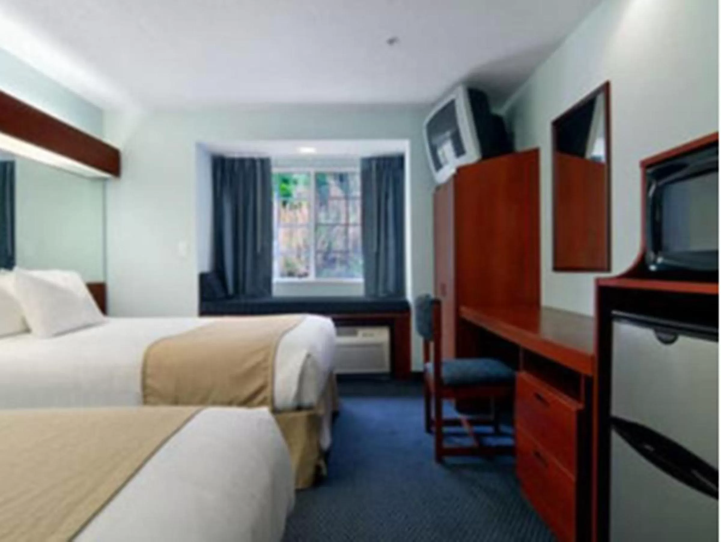 Bedroom in Microtel Inn & Suites by Wyndham Gardendale - Birmingham North