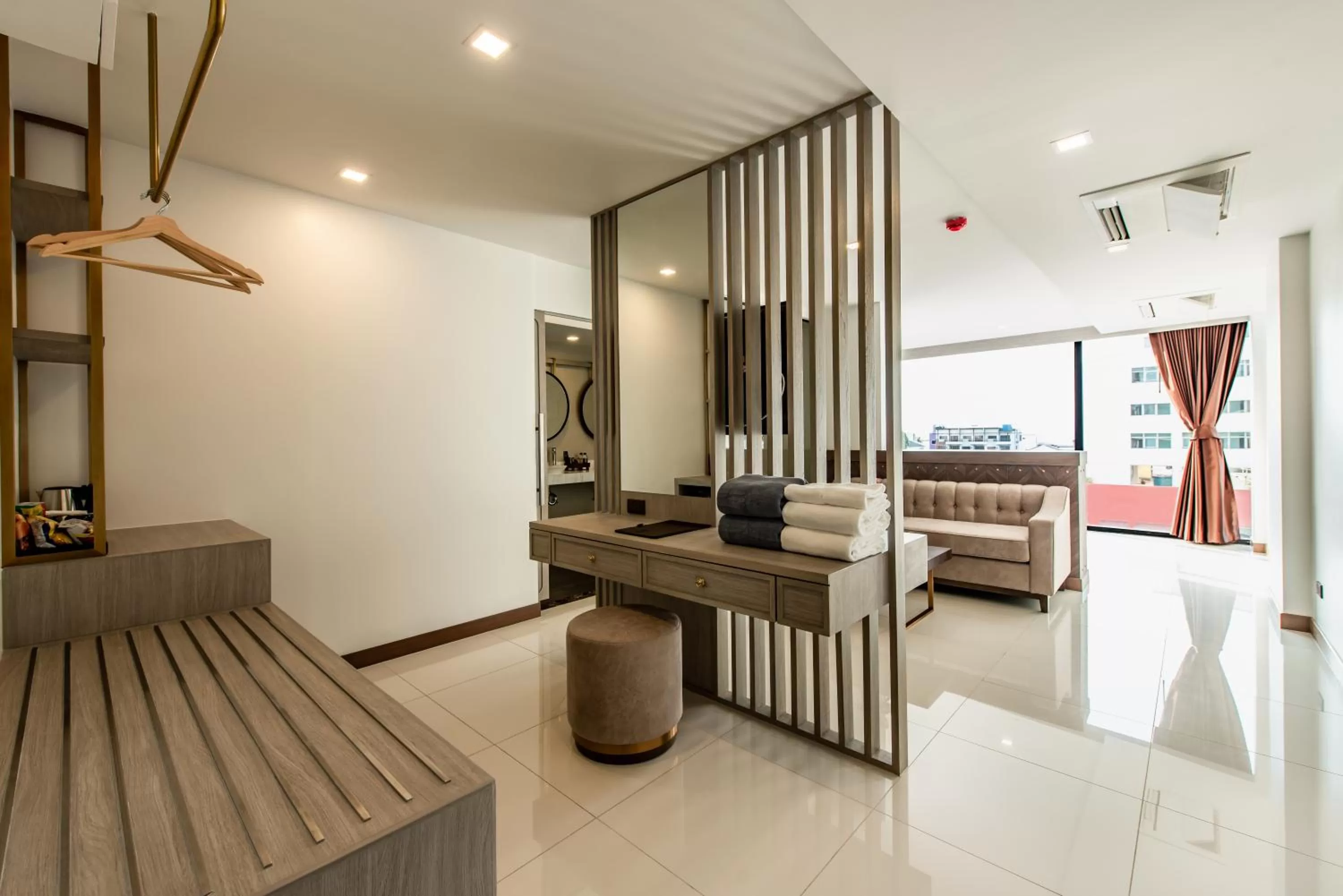 Living room in Blackwoods Hotel Pattaya - SHA Extra Plus