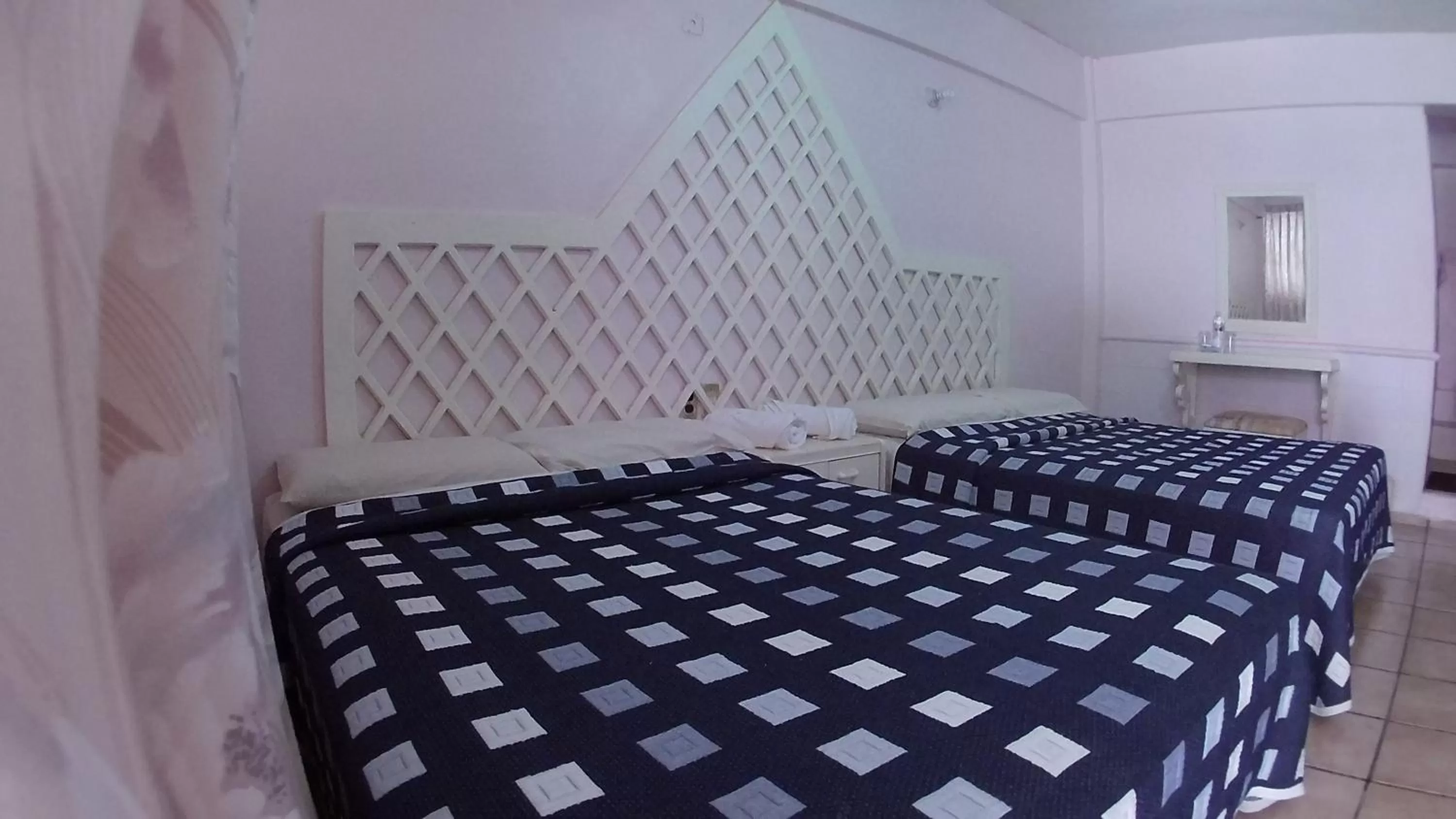 Bed in Hotel Michelle