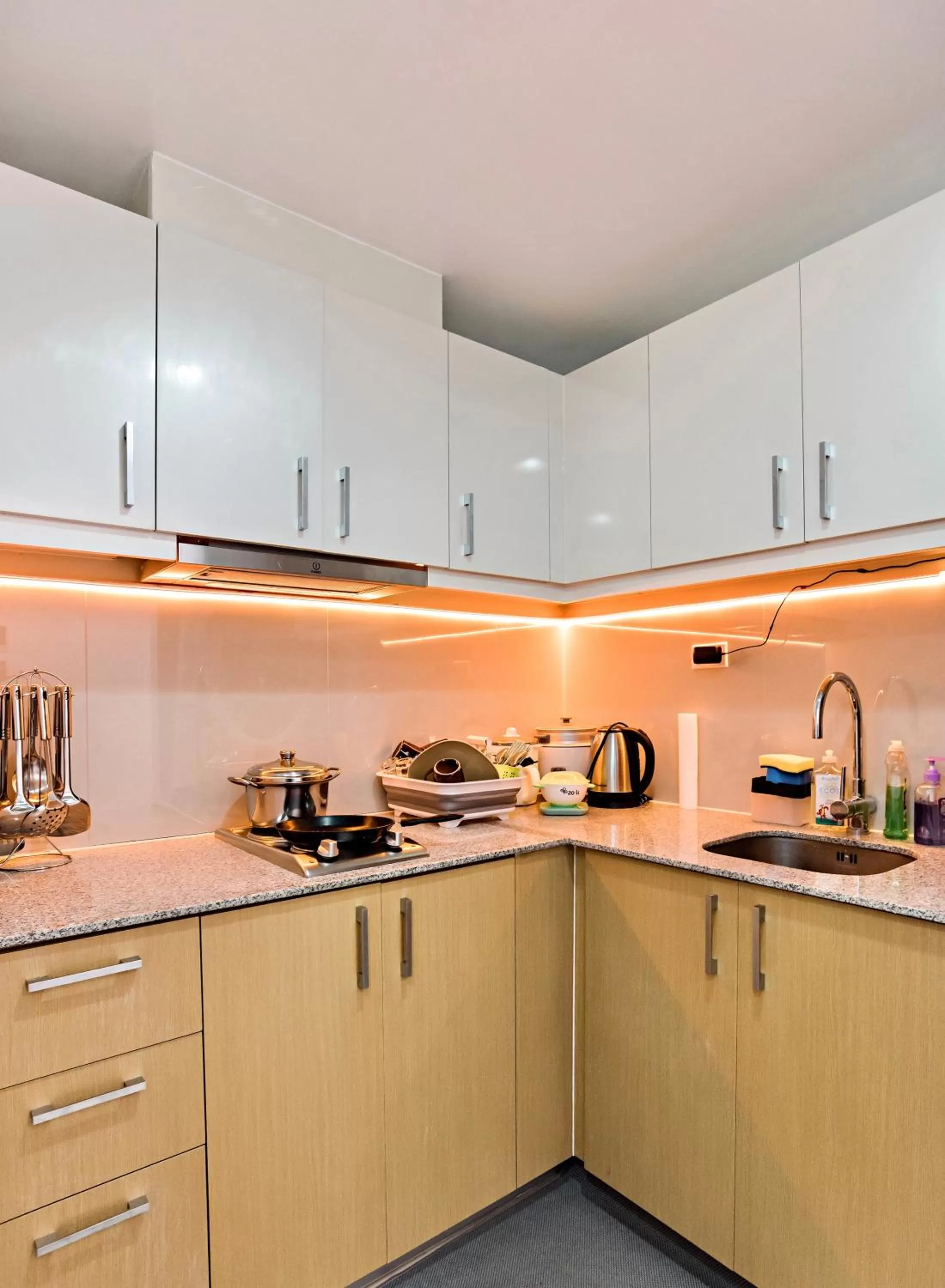 Kitchen or kitchenette in 1BR Suite in Uptown BGC
