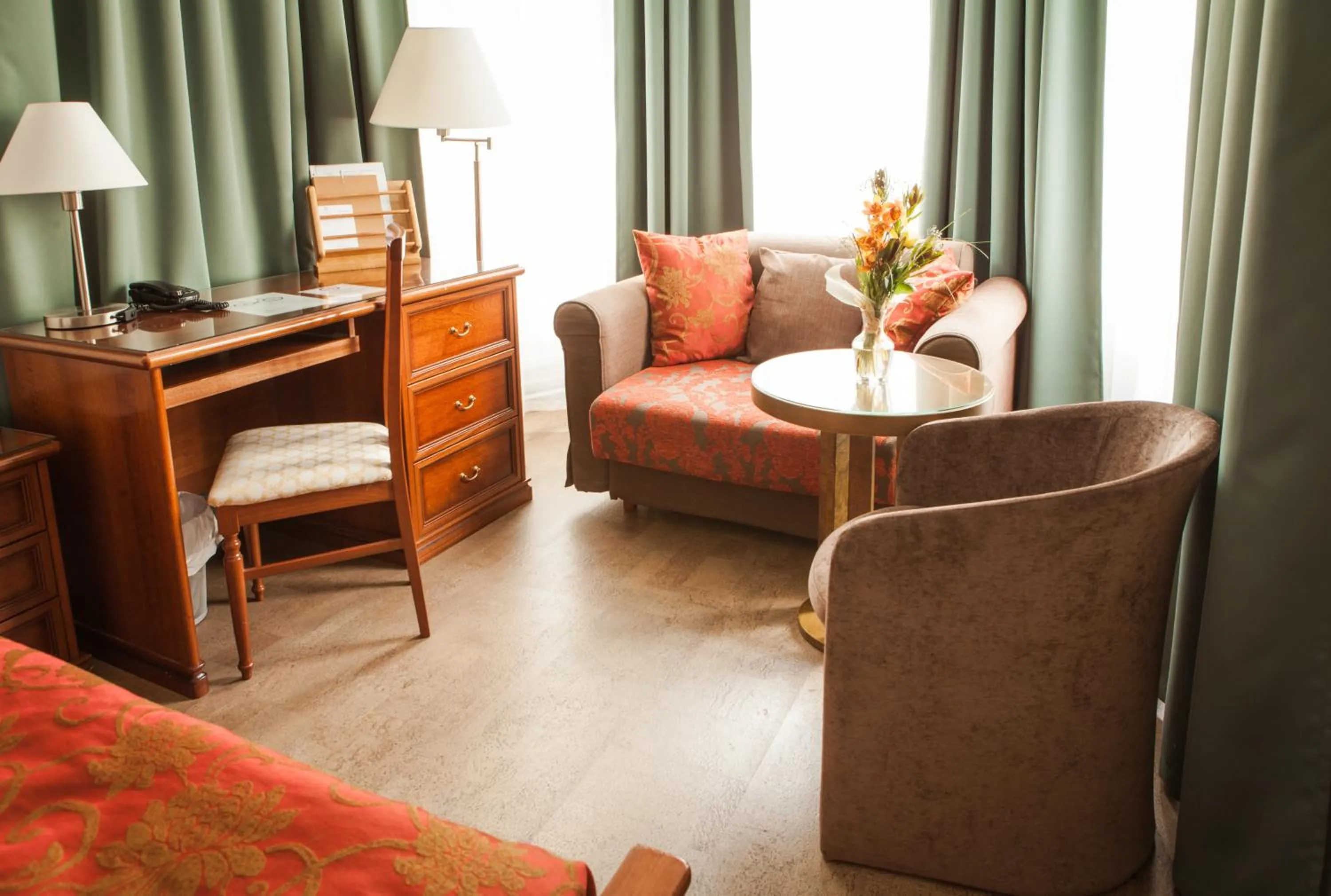 Seating area, Bed in Hotel St. Barbara