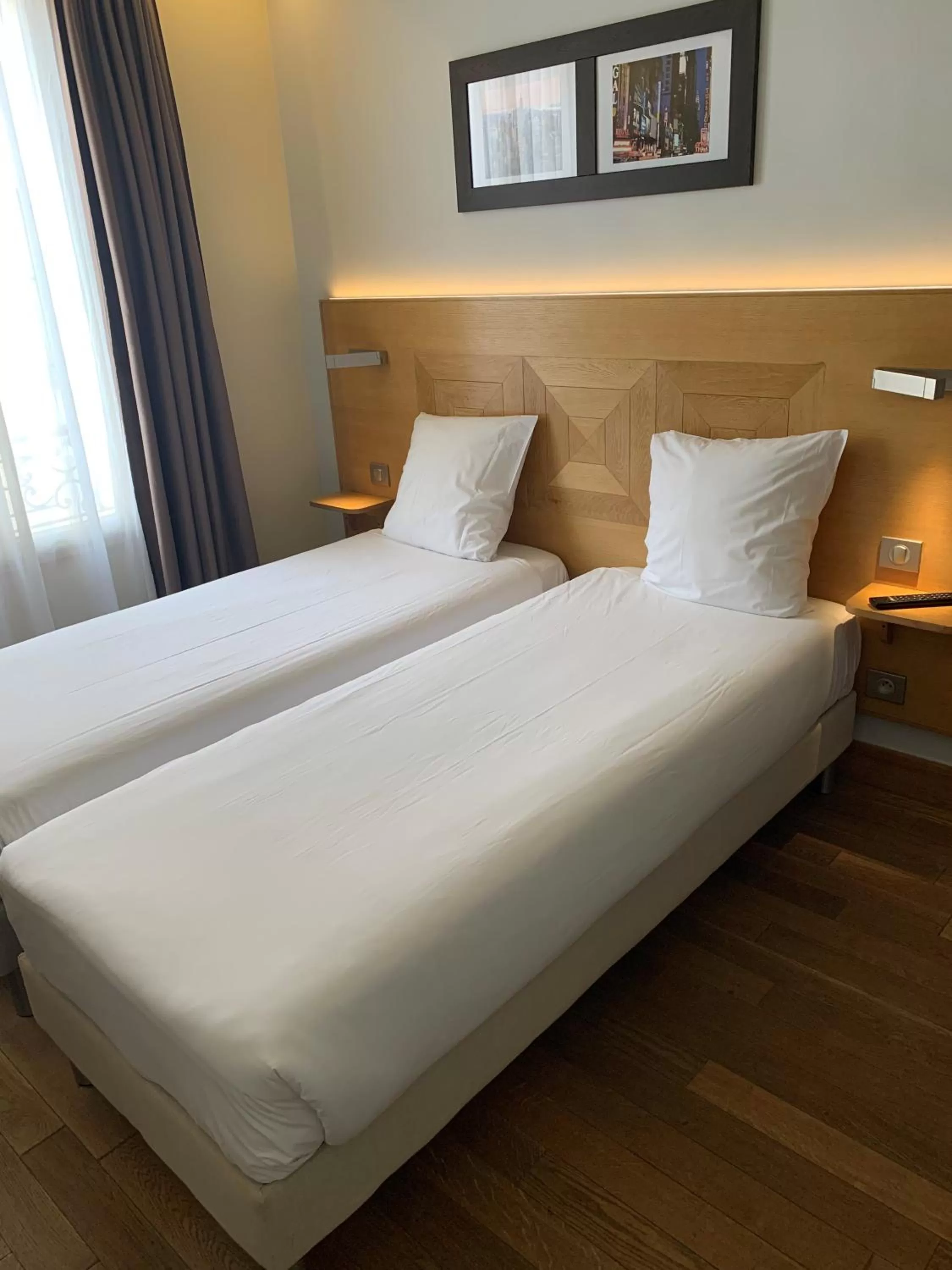 Bed in Hôtel Eiffel XV