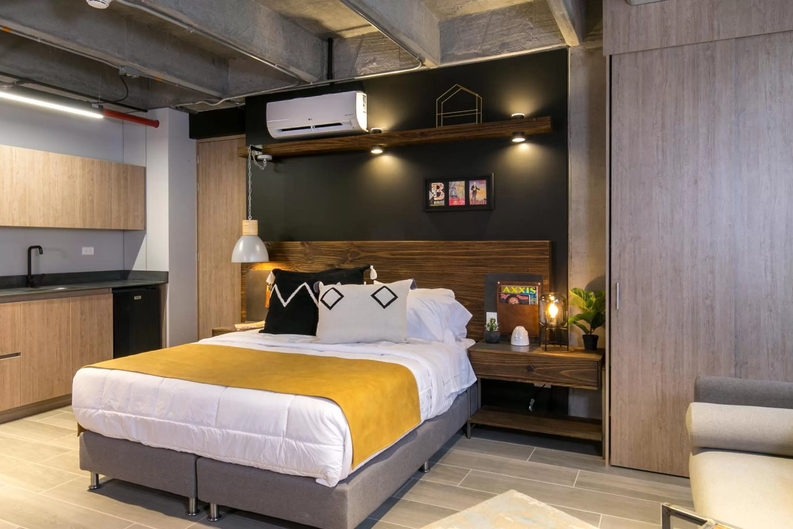 Bed in Factory Lofts Hotel