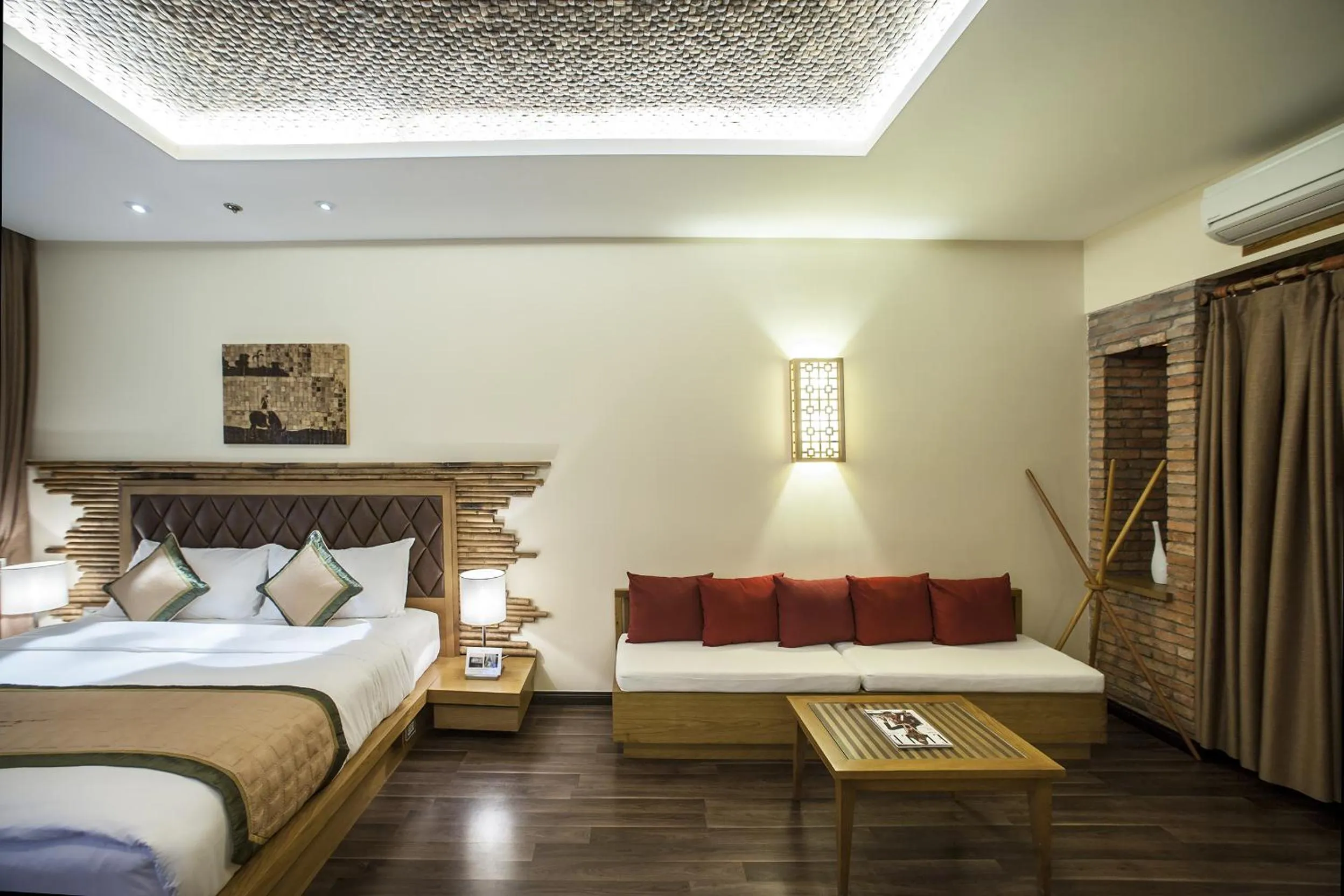 Living room, Bed in Aroma Beach Resort and Spa