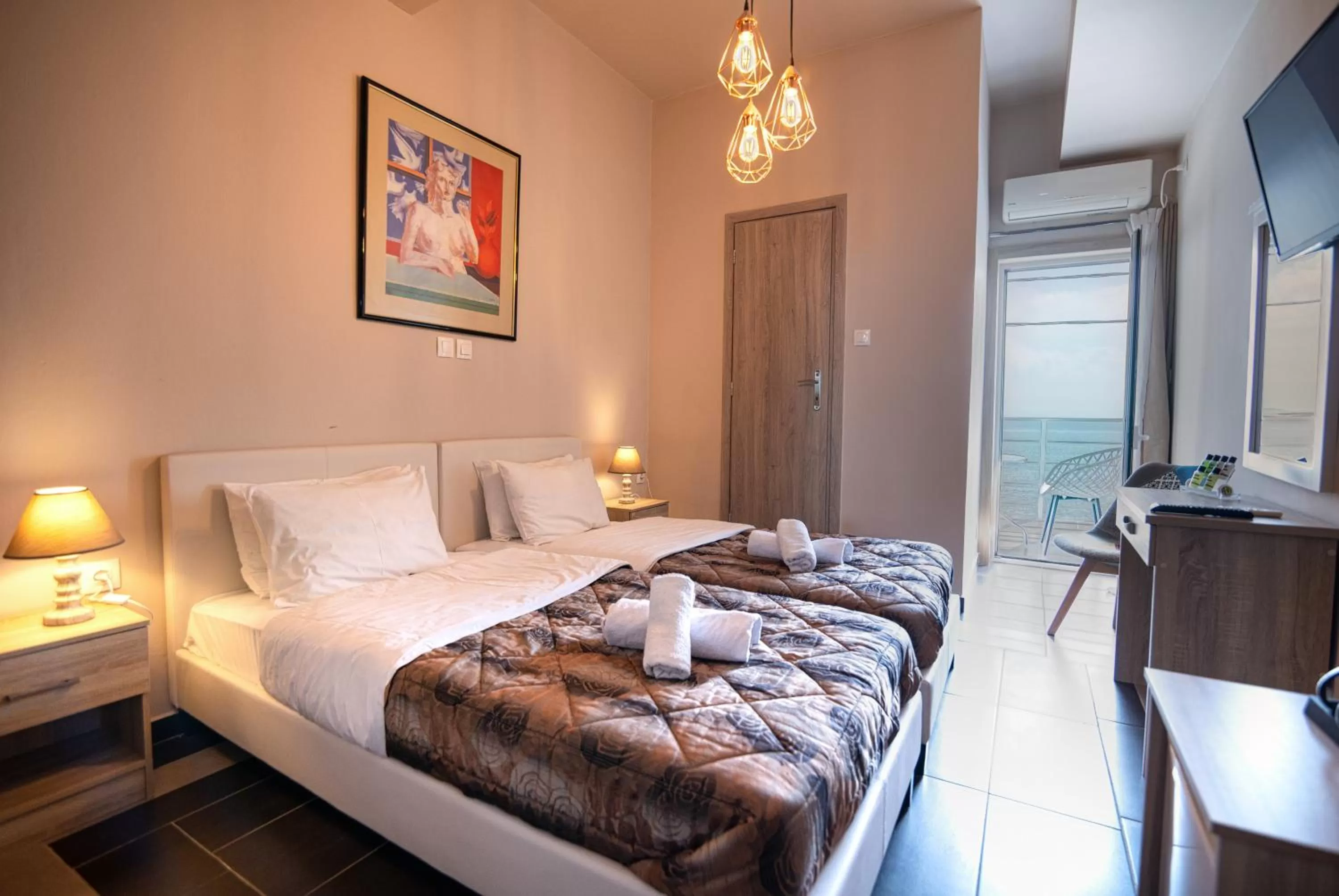 Bed in Votsalakia Hotel & Luxury Apartments